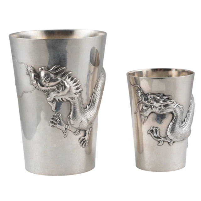 Two late 19th century Chinese Export white metal beakers, by...