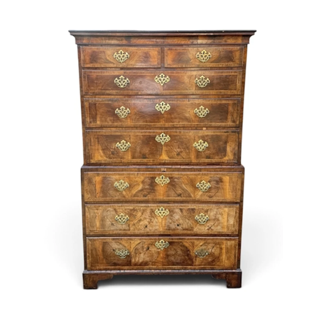A MID-18TH CENTURY WALNUT OYSTER VENEERED AND BANDED CHEST O...