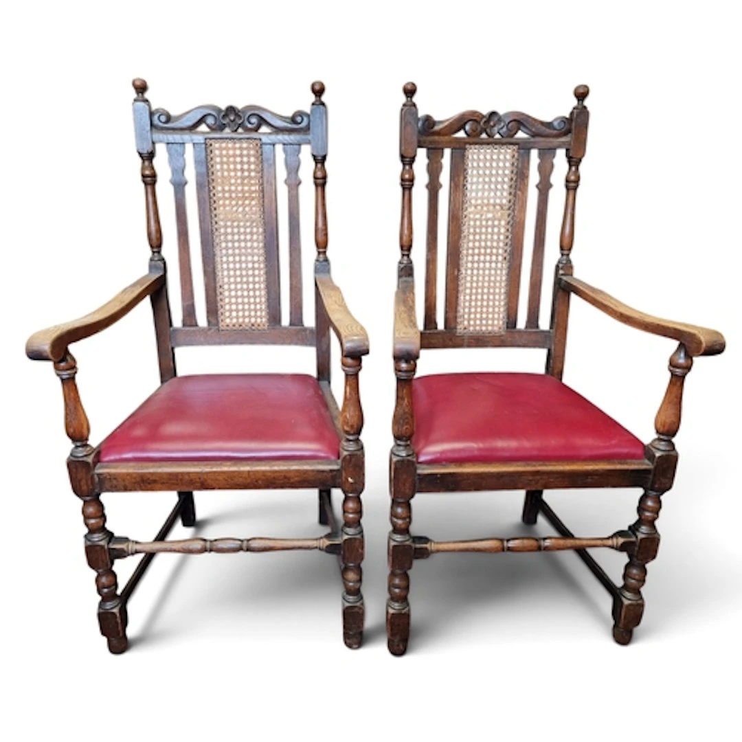 A pair of late 19th early 20th Century Oak Carvers with cane...