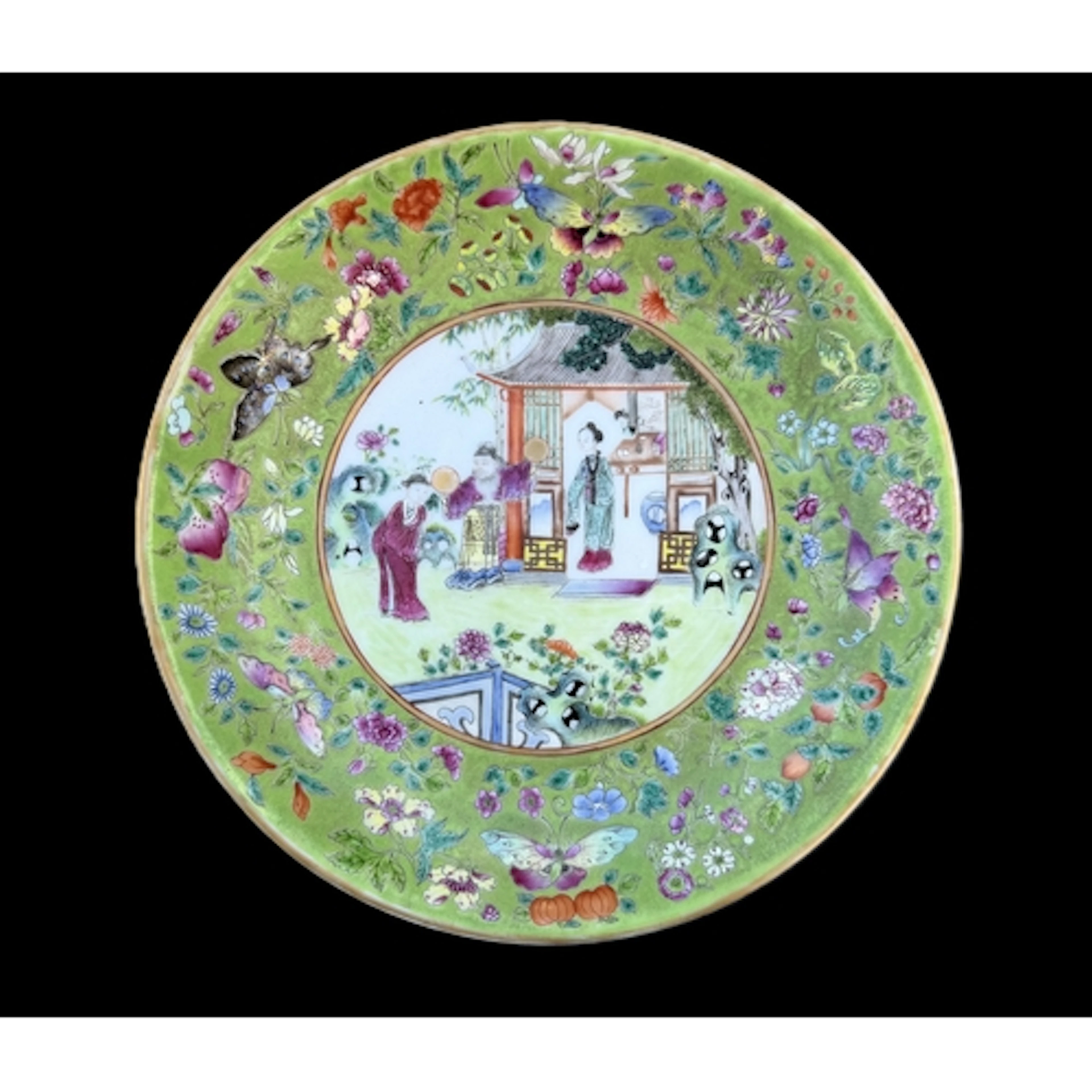 A Chinese Canton Famille Rose porcelain plate with bright gr...