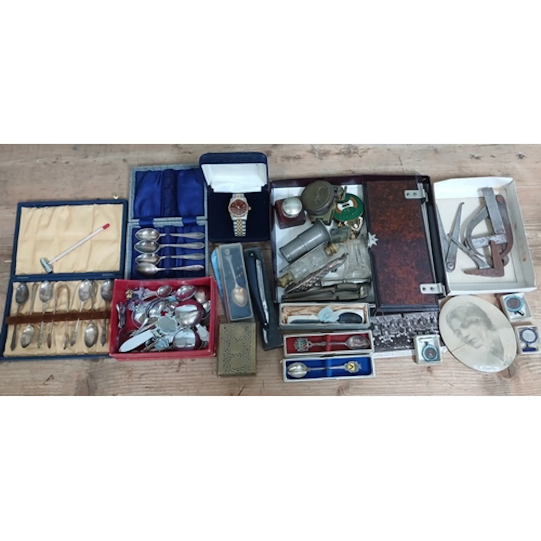 A box of assorted collectables including silver etc.