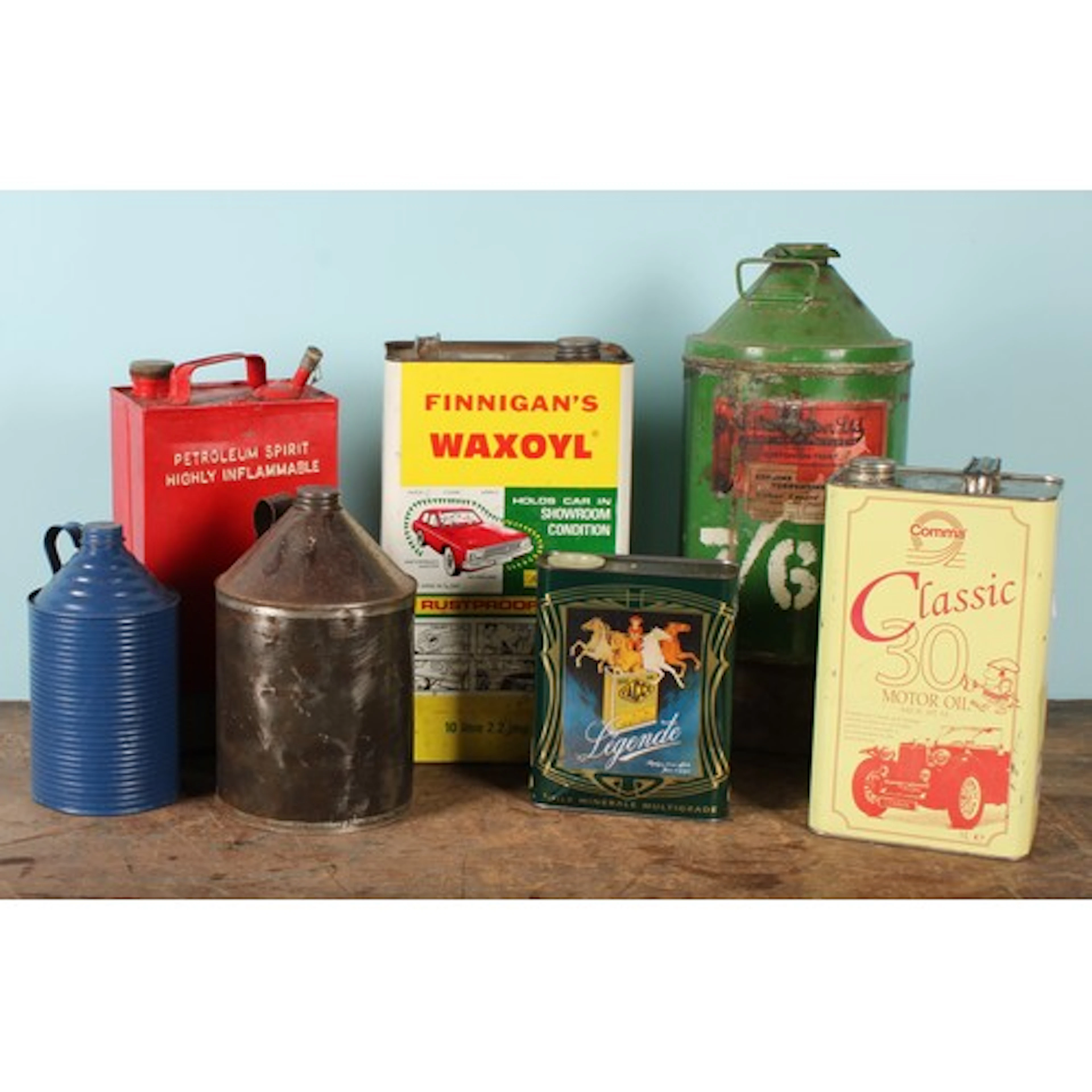 A 1970's ten litre can, FINNIGAN'S WAXOYL, illustrated with ...