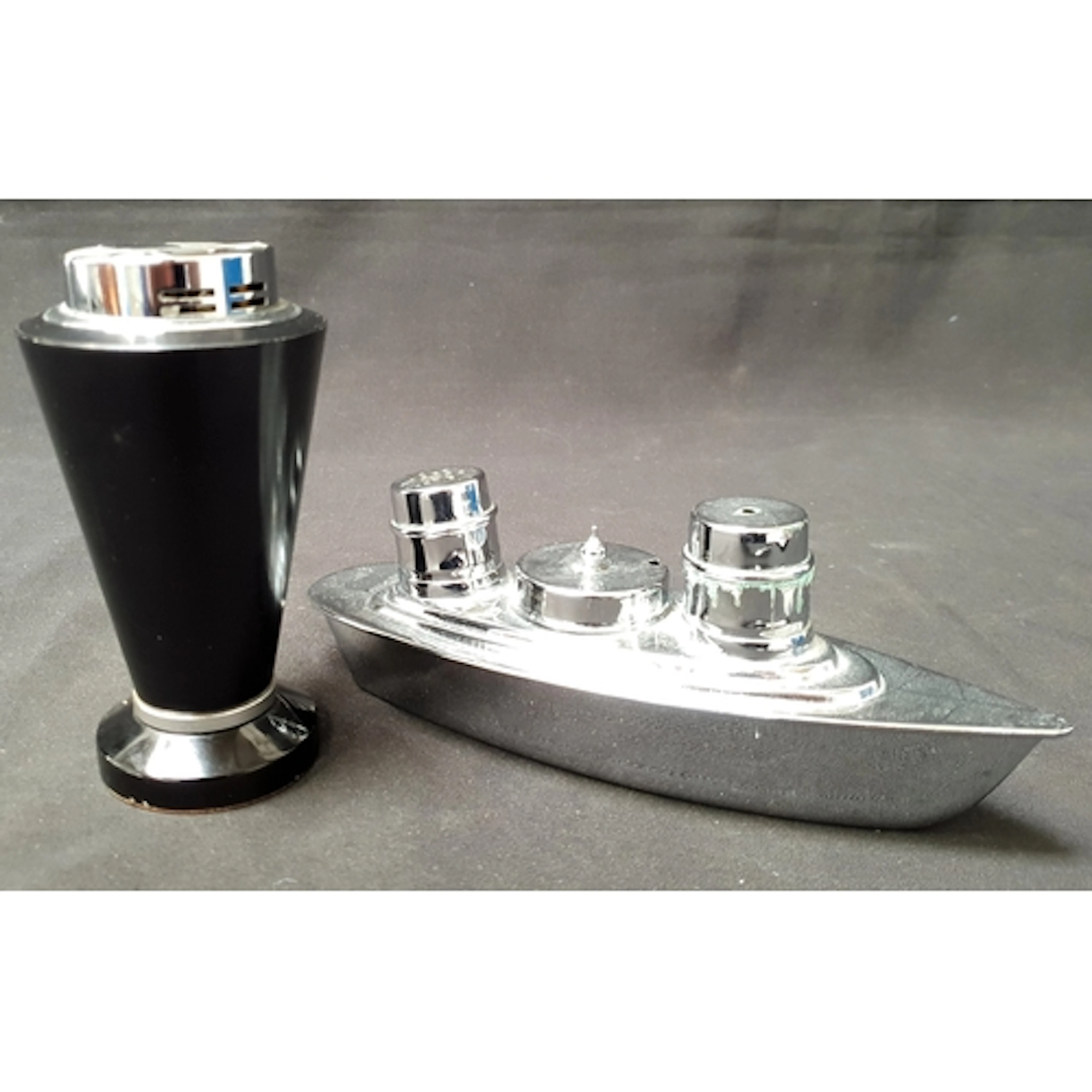 ART DECO TABLE LIGHTER featuring a Bakelite conical body and...