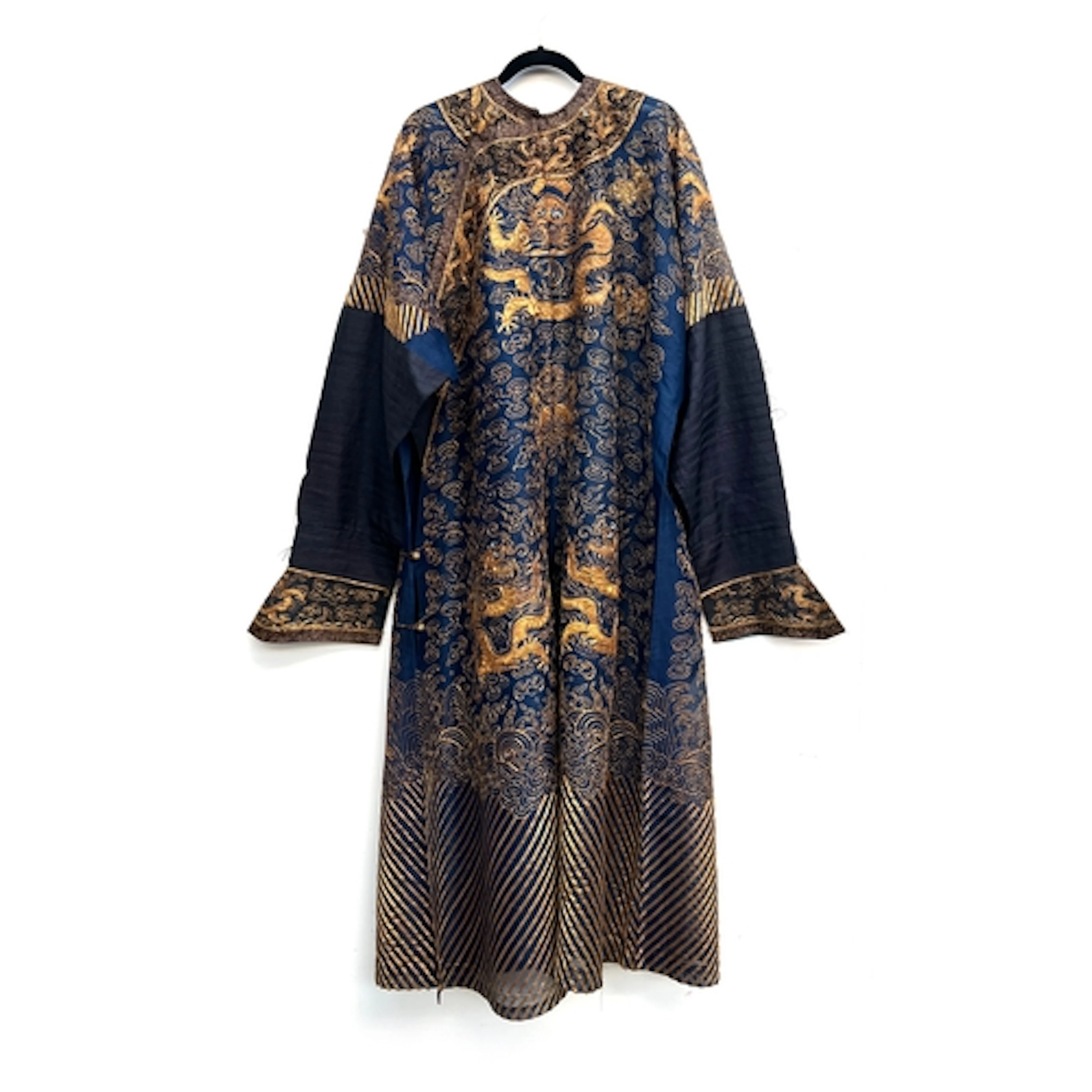 An antique Chinese blue and gold Jifu dragon robe, the navy ...