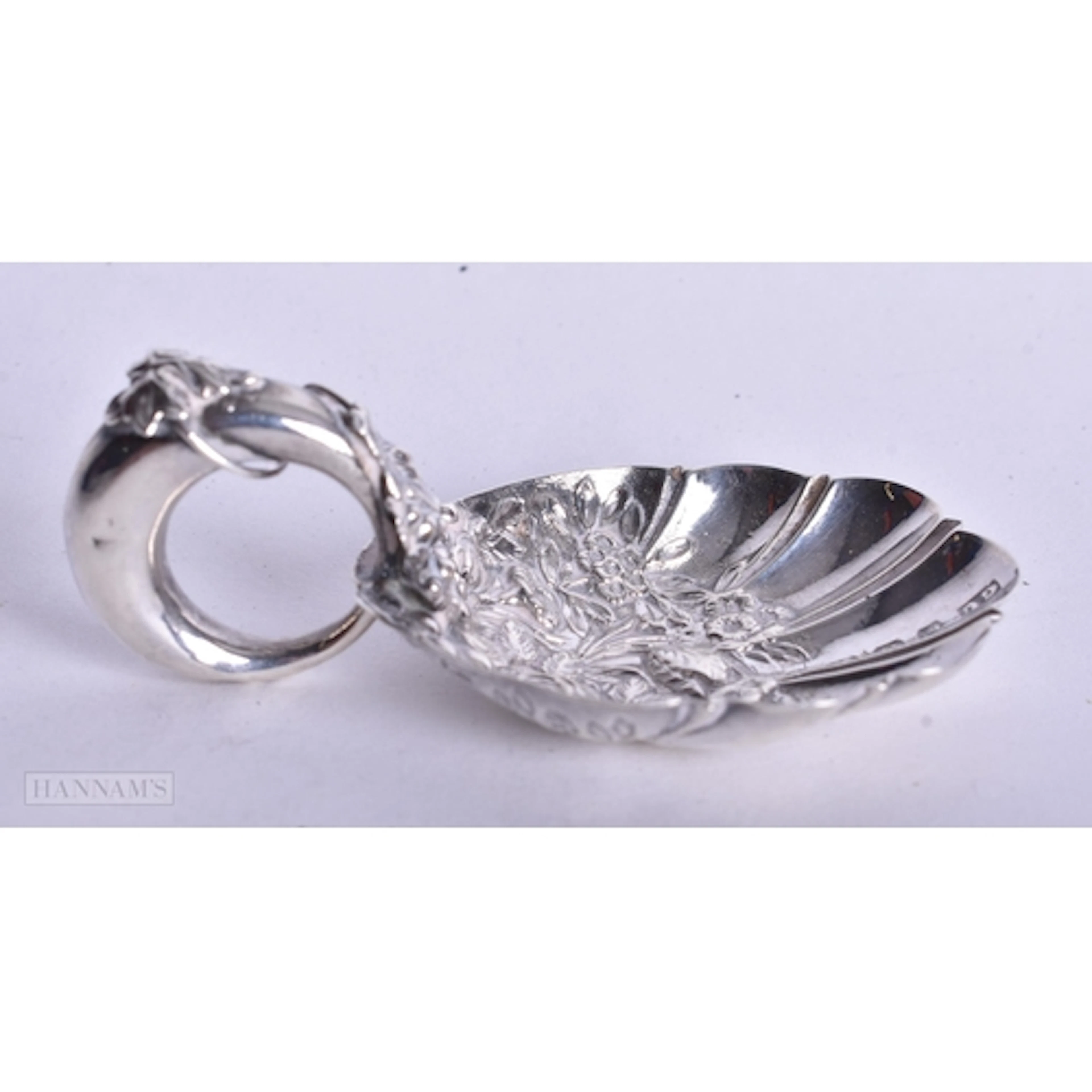 AN ANTIQUE George UNITE SILVER CADDY SPOON. 12 grams. 6.75 c...