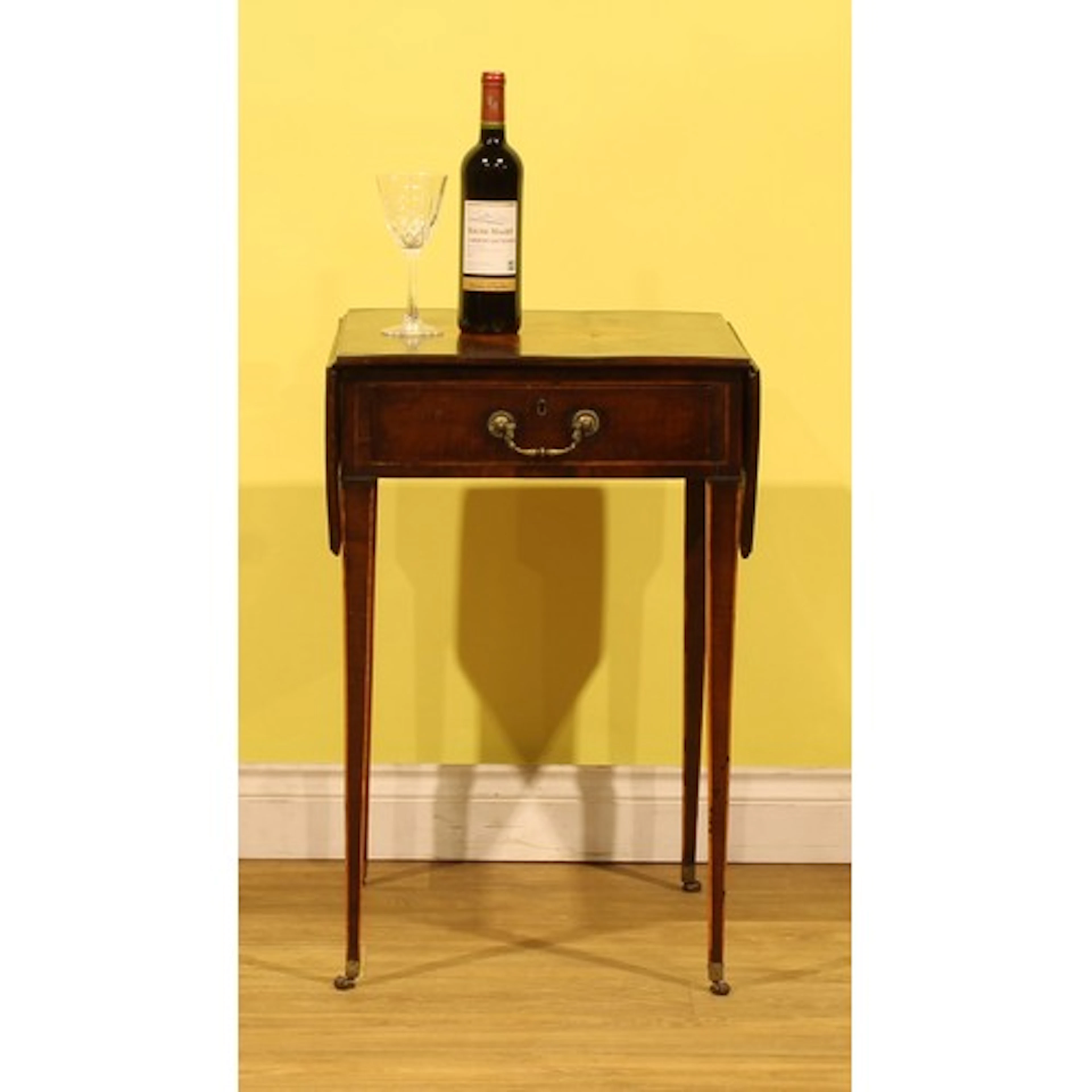 A George III Sheraton period mahogany and tulipwood crossban...