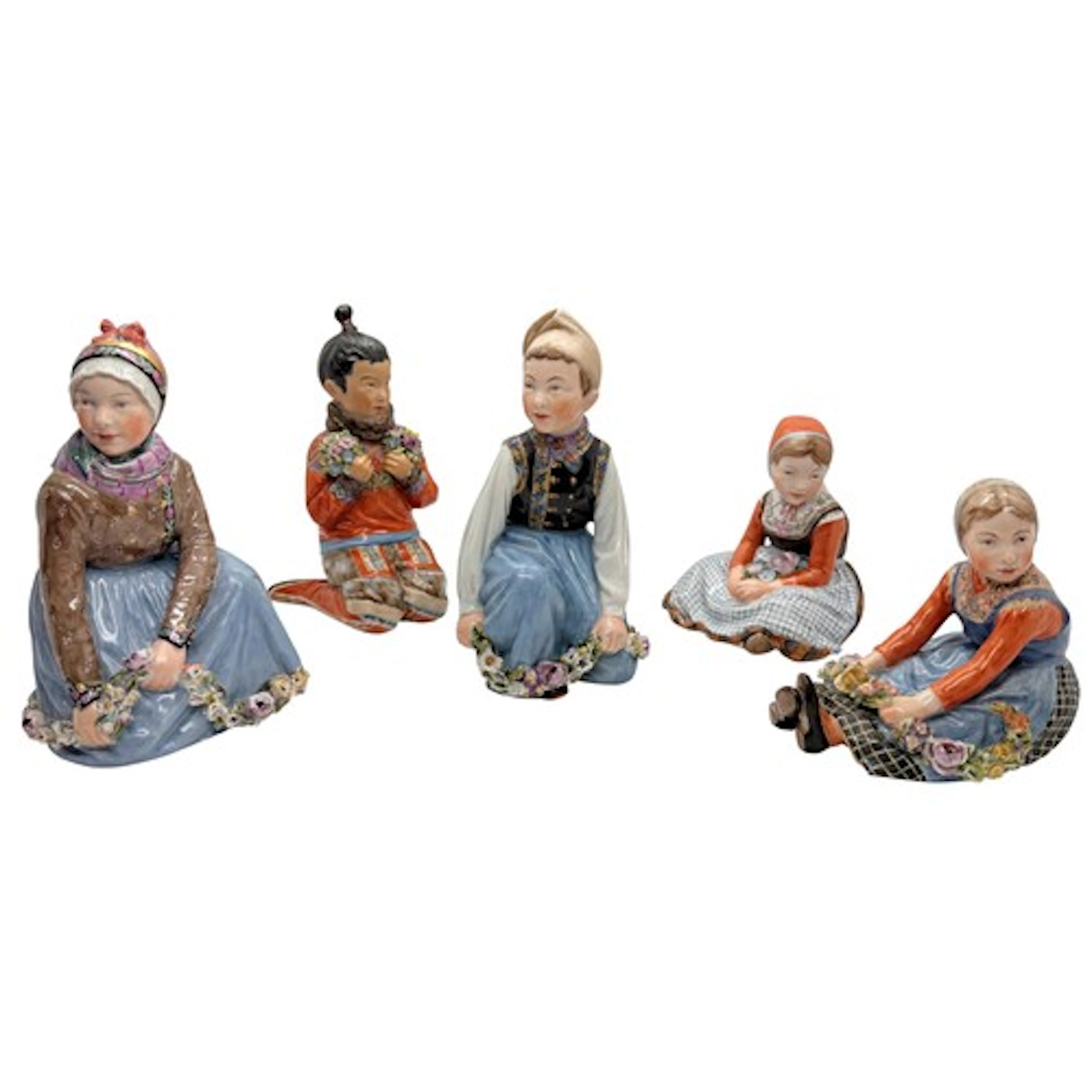 Five Royal Copenhagen porcelain figures, children in nationa...