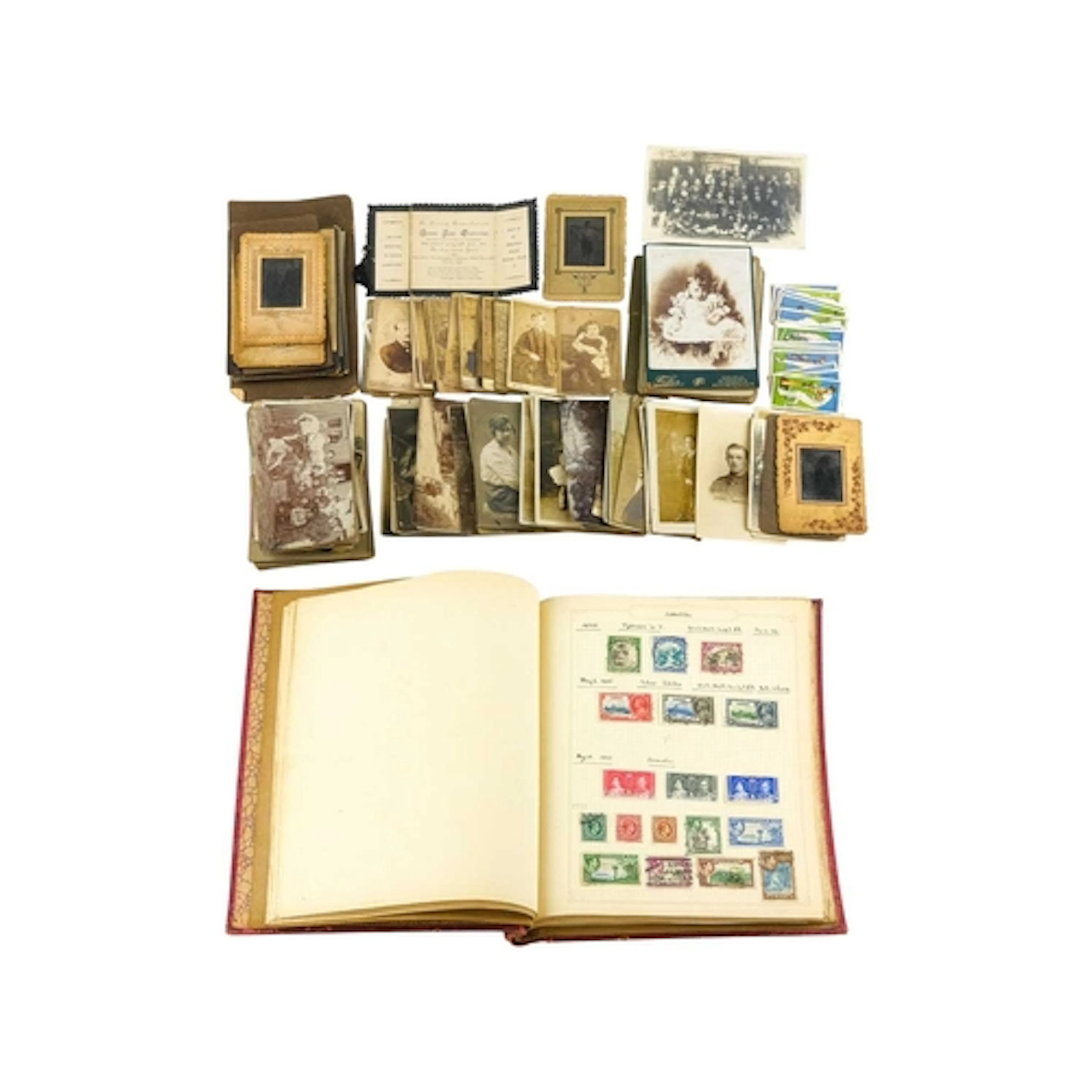 Mixed lot of photographs, postcards and stamps. A small box ...