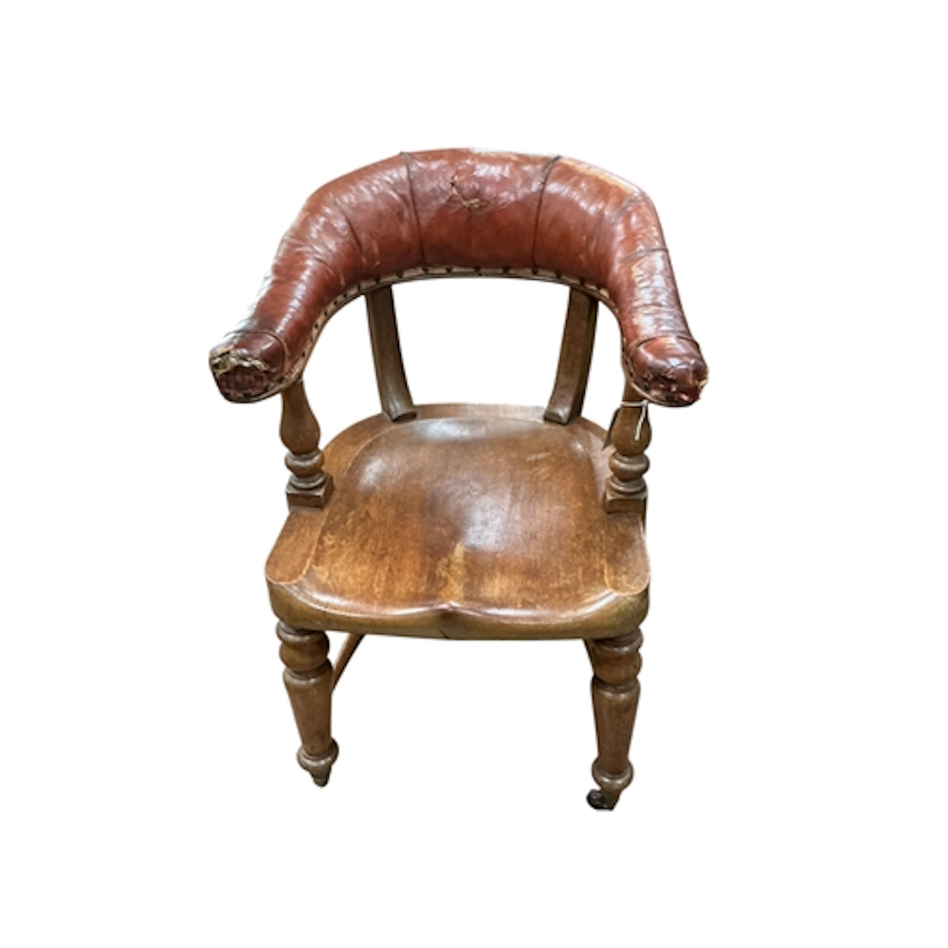 A Victorian oak desk chair with a burgundy leather back, wid...