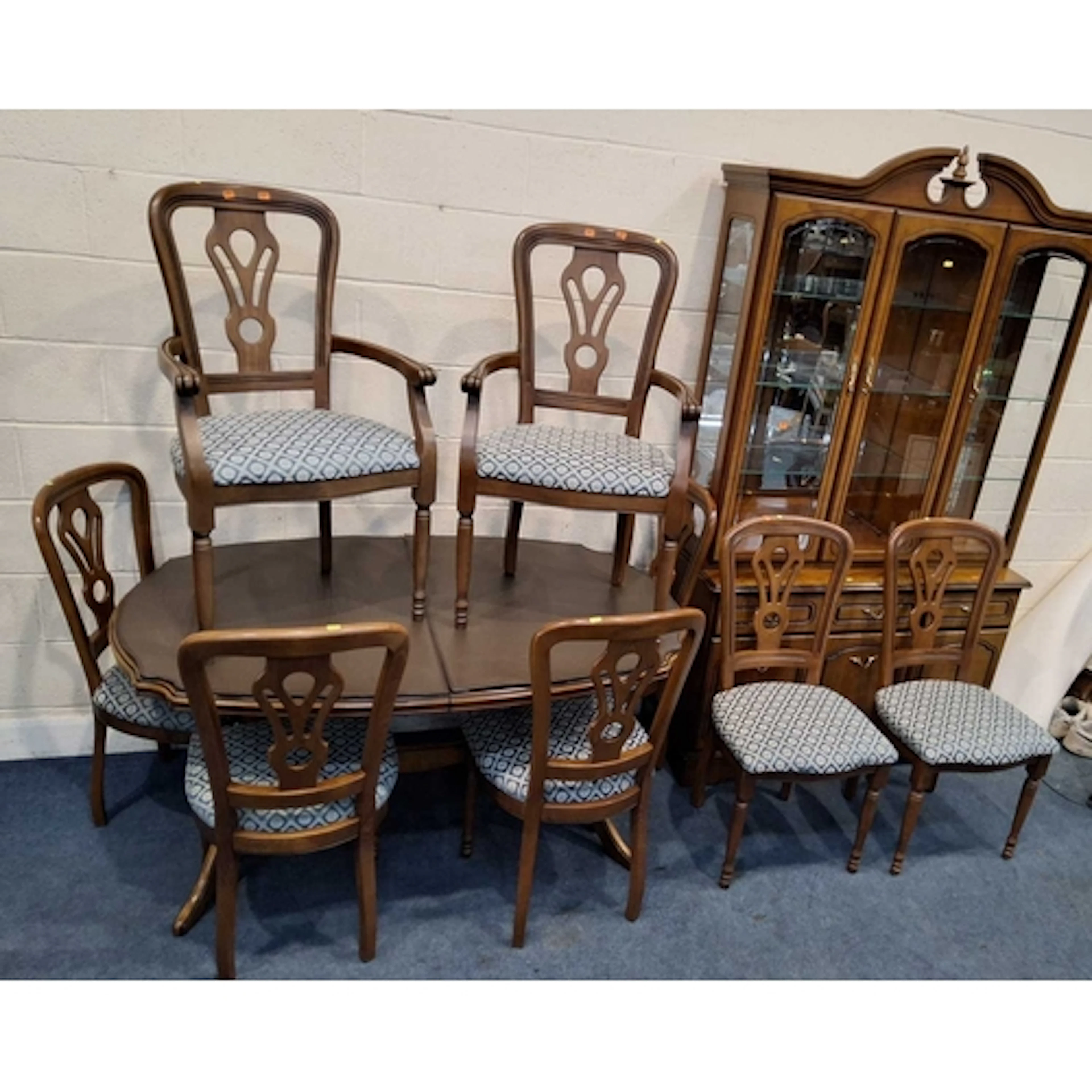 A REPRODUCTION EXTENDING DINING TABLE, with a single fold ou...