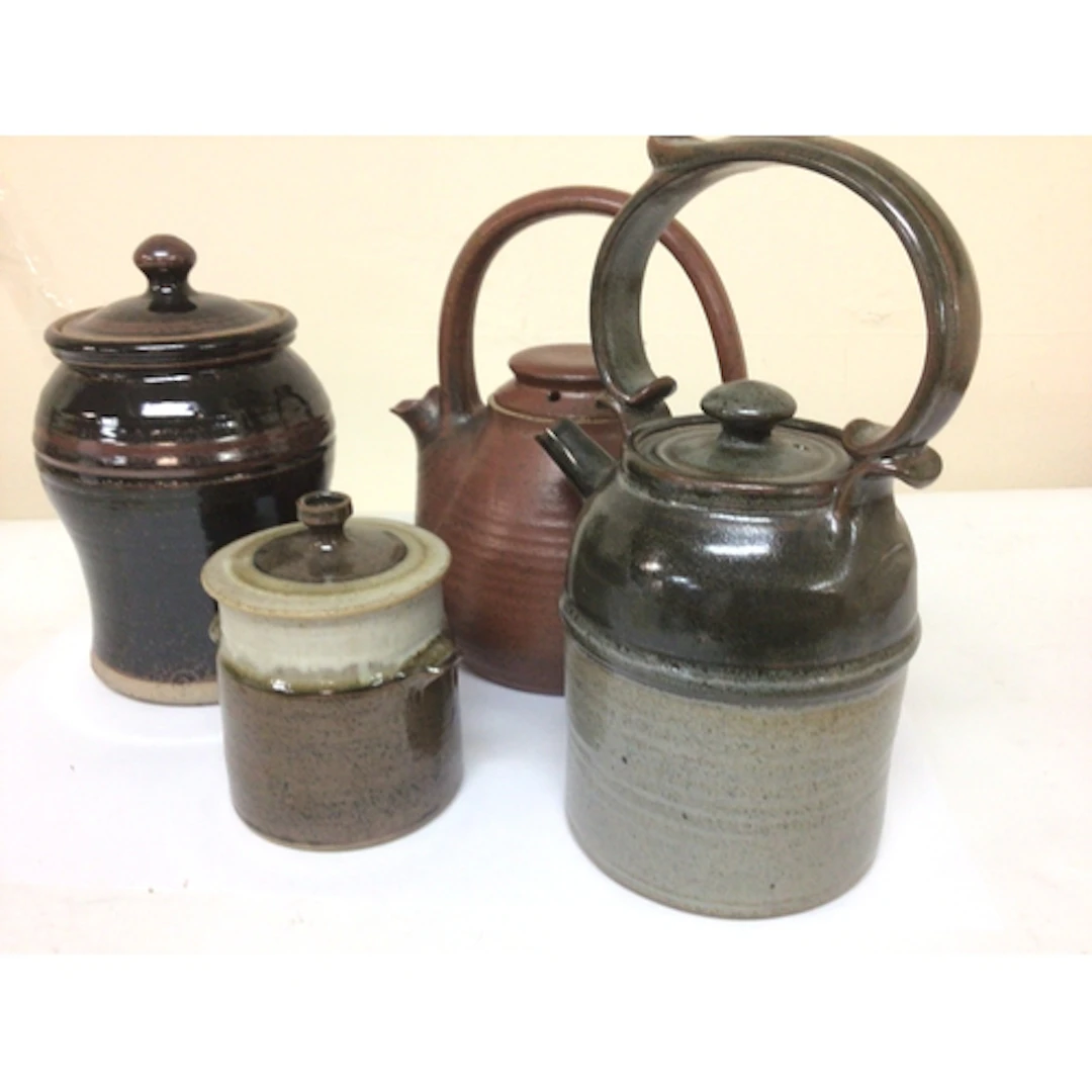 A collection of 20th century Studio Art Pottery two tea pots...