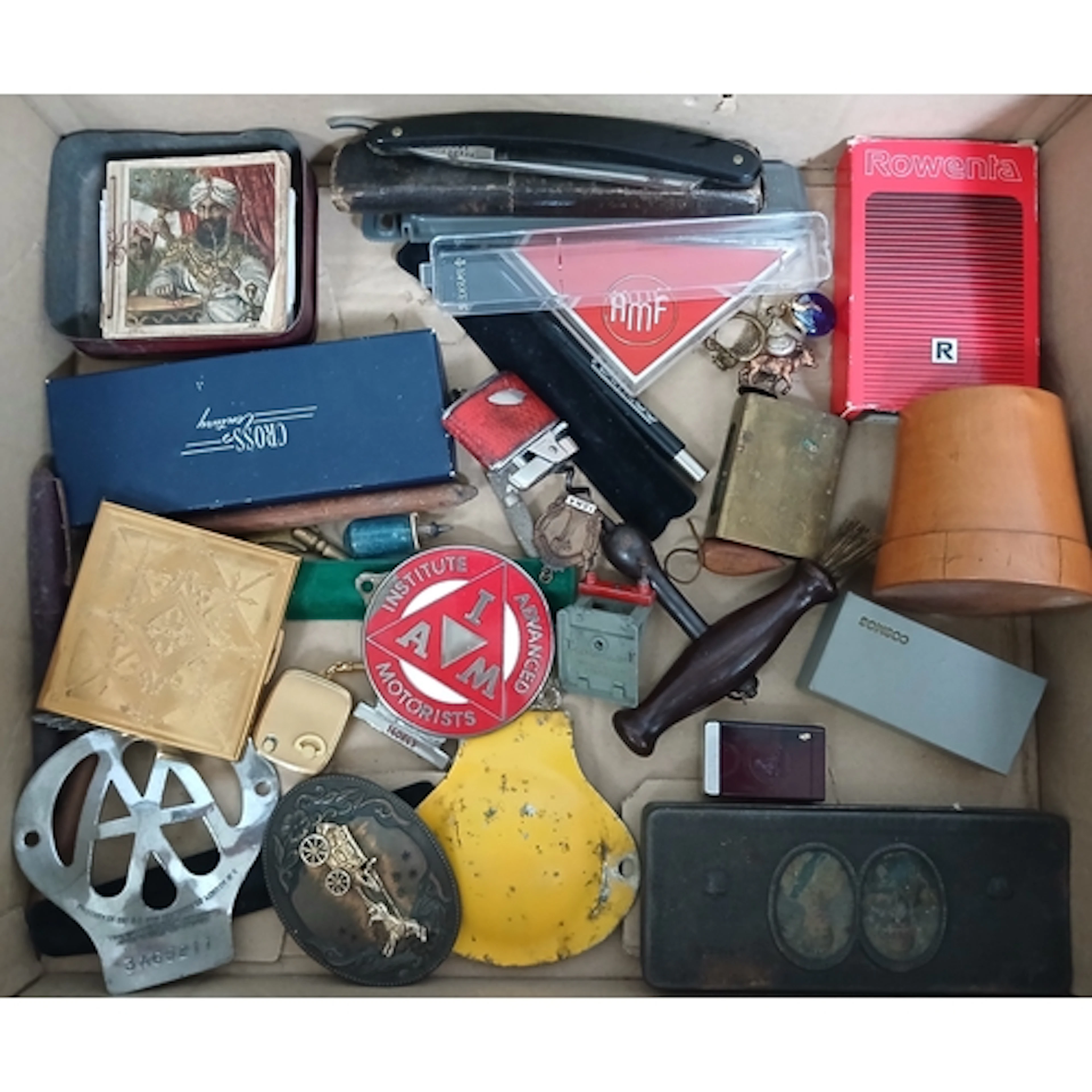 A box of assorted collectables.