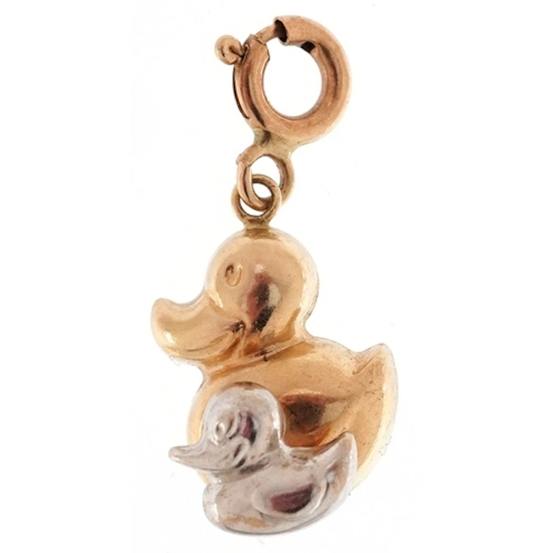 14ct two tone gold charm in the form of a duck with duckling...