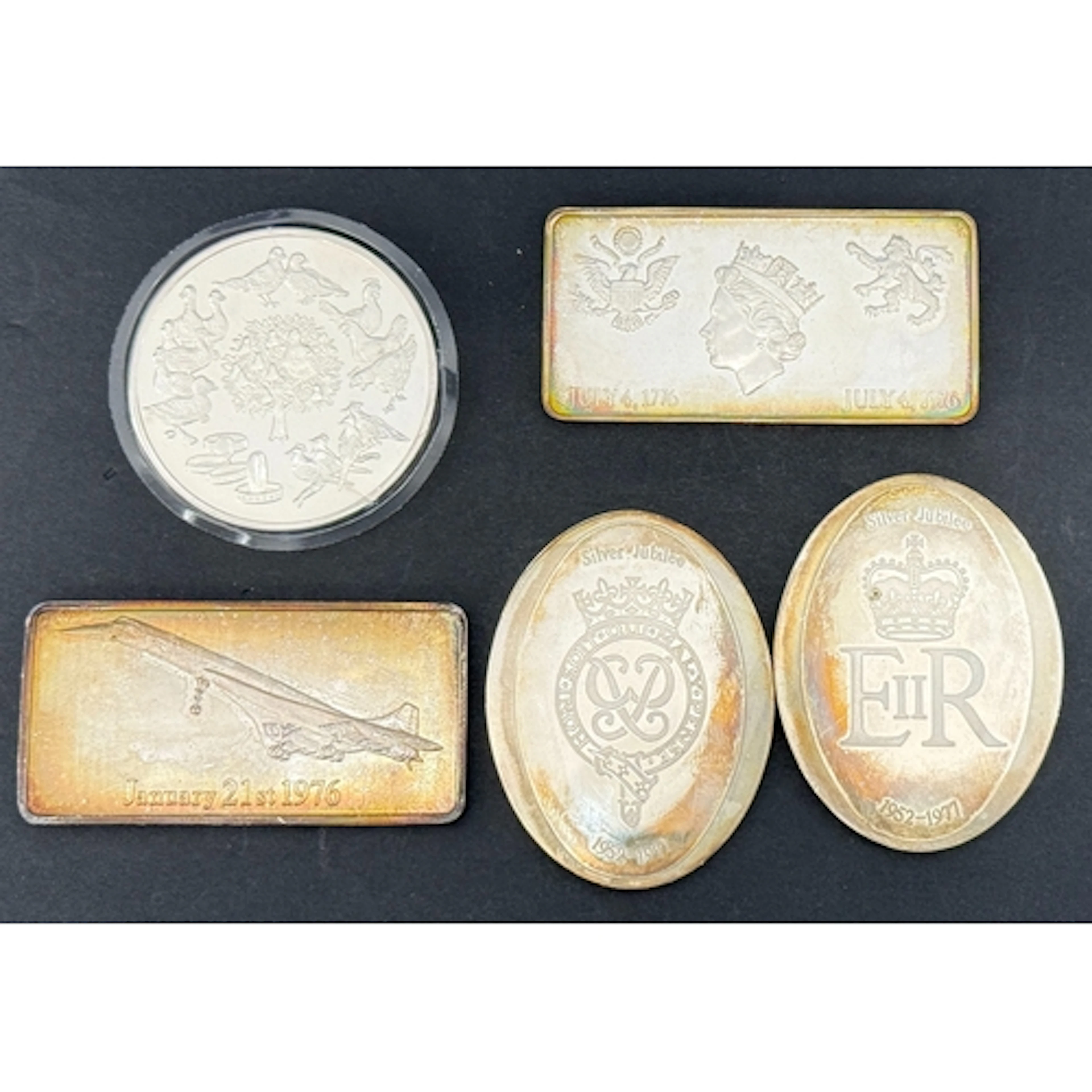 A group of five Danbury Mint 1970s sterling silver commemora...