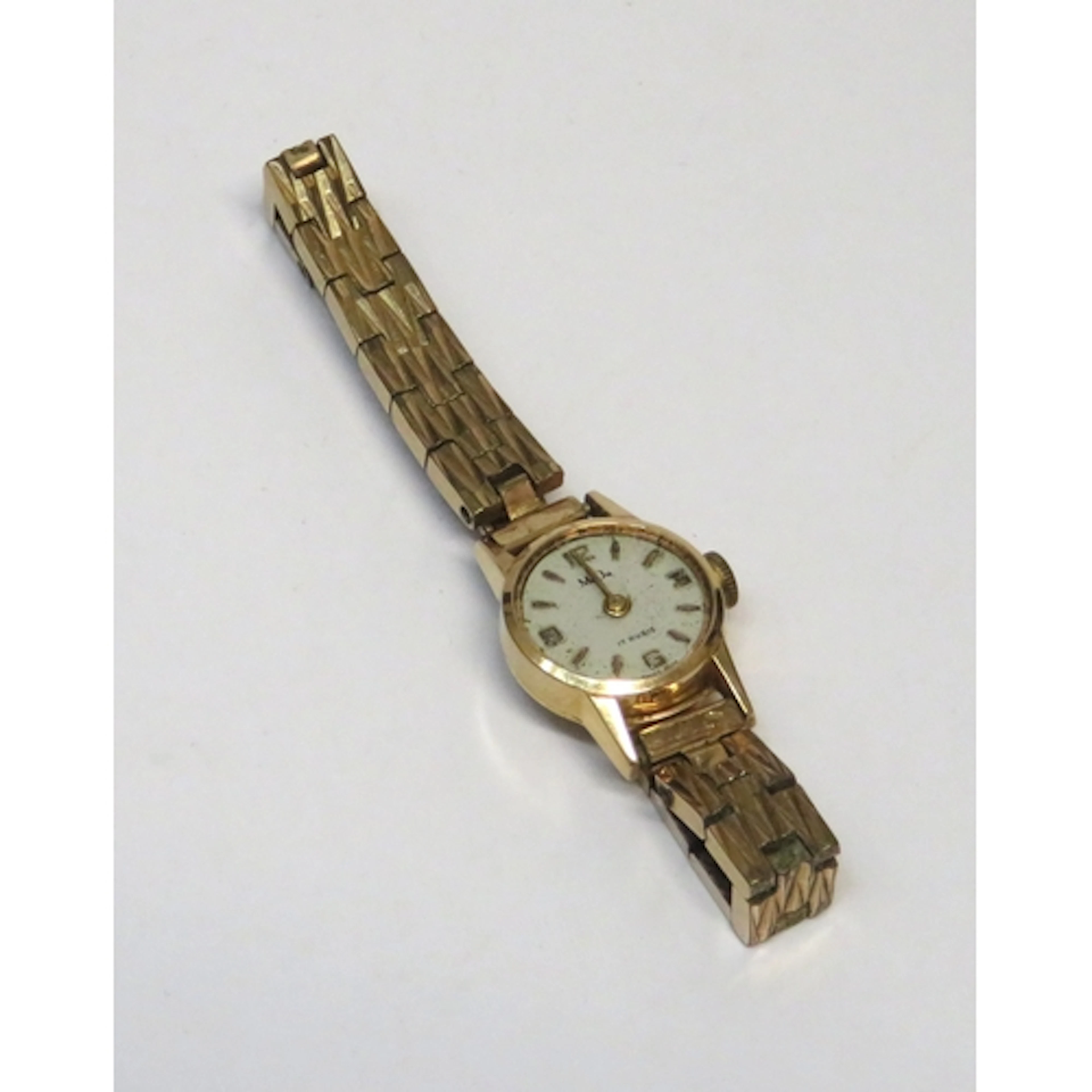 Ladies' Mudu 18ct gold cased wristwatch, on a metal bracelet...