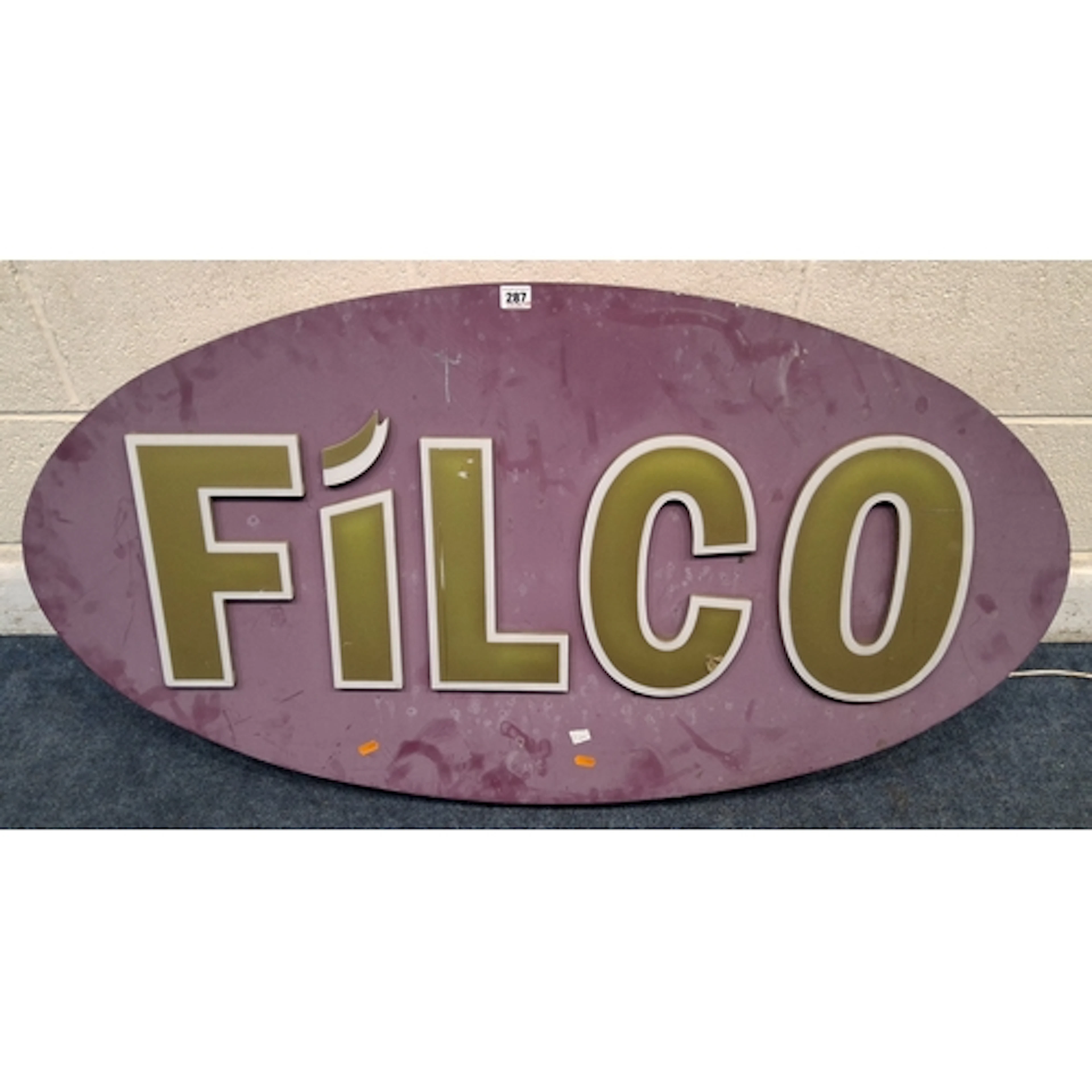 A PURPLE OVAL METAL SHOP SIGN, reading Filco (width 122cm x...