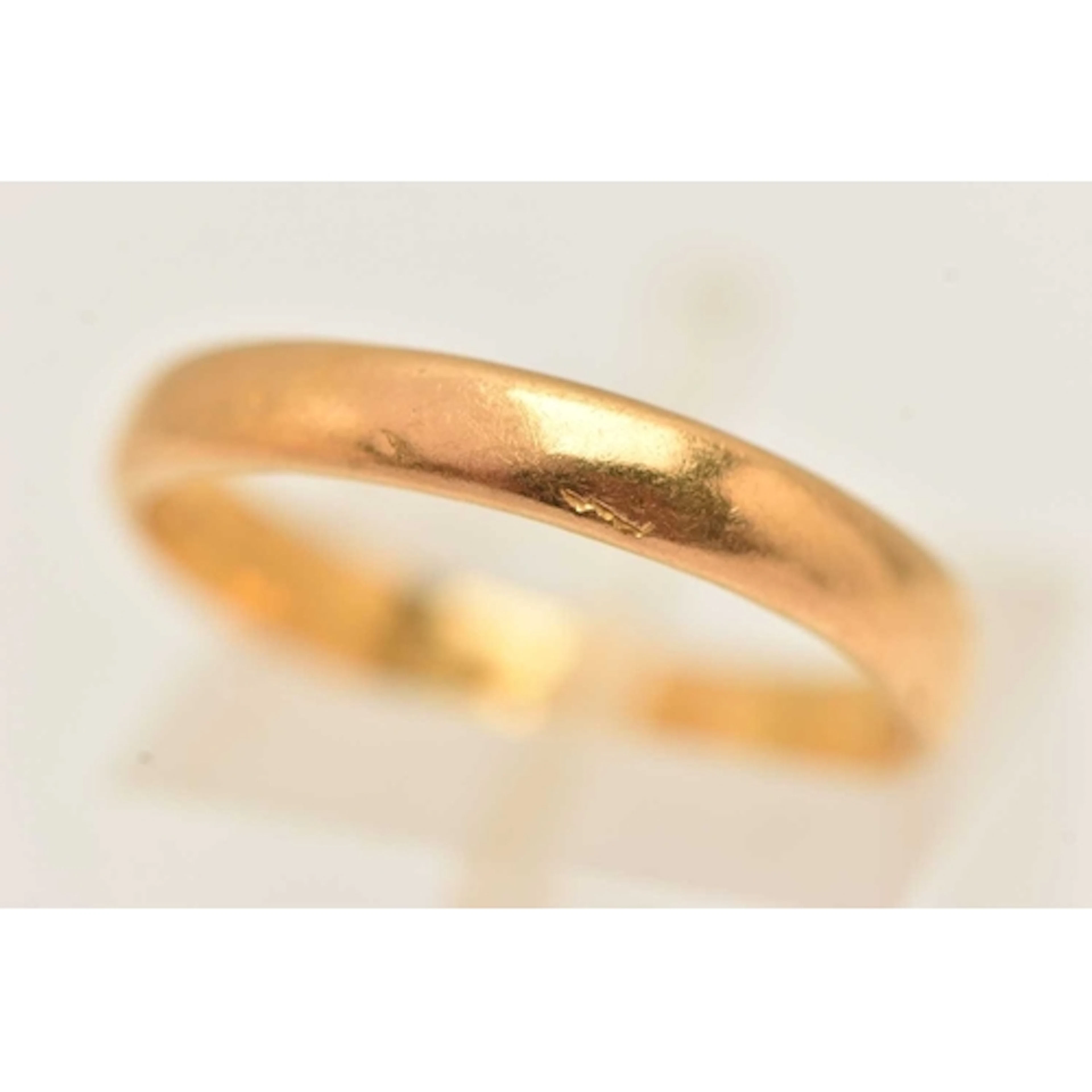 A 22CT GOLD BAND RING, a plain polished band ring, approxima...