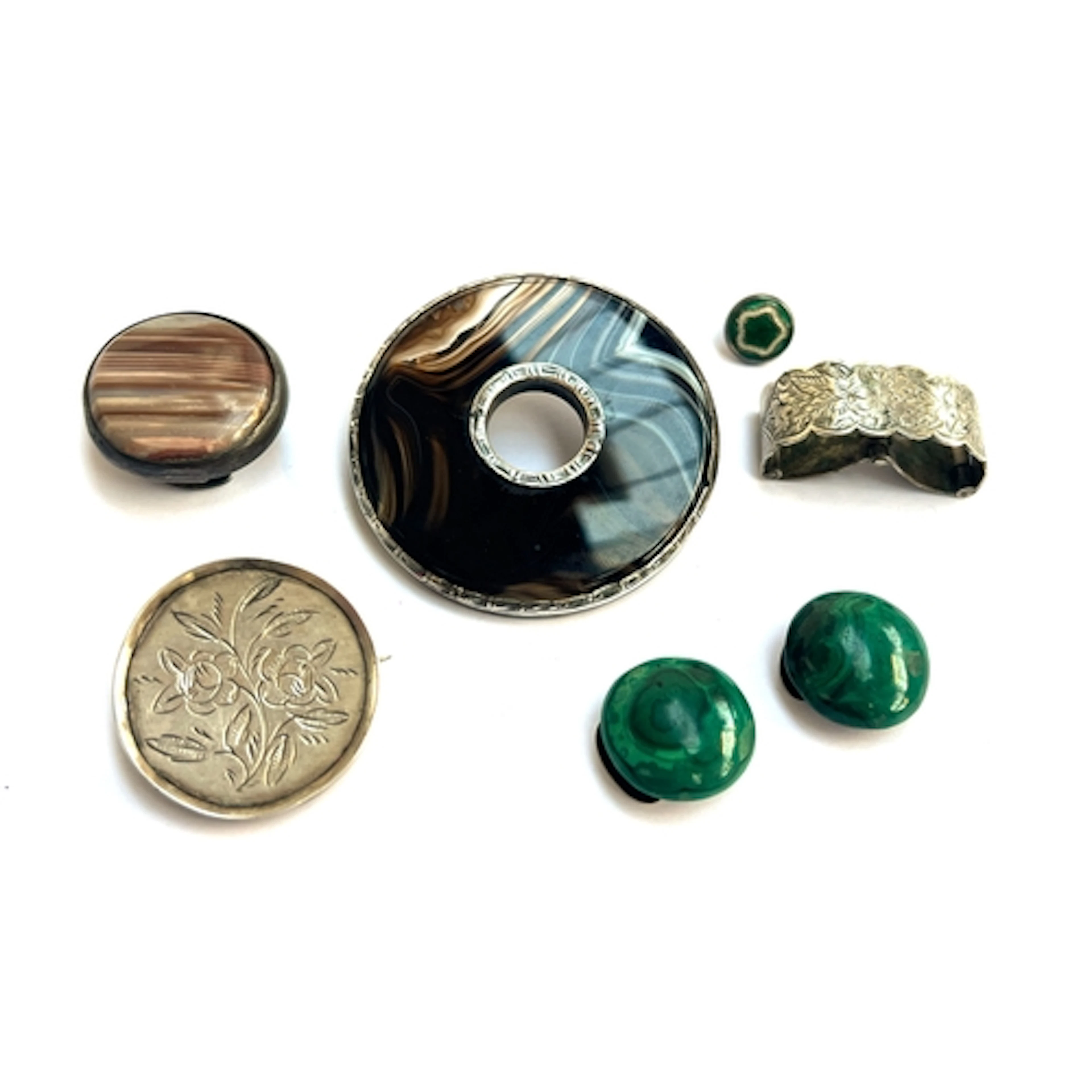 A pair of antique silver mounted malachite buttons; a silver...