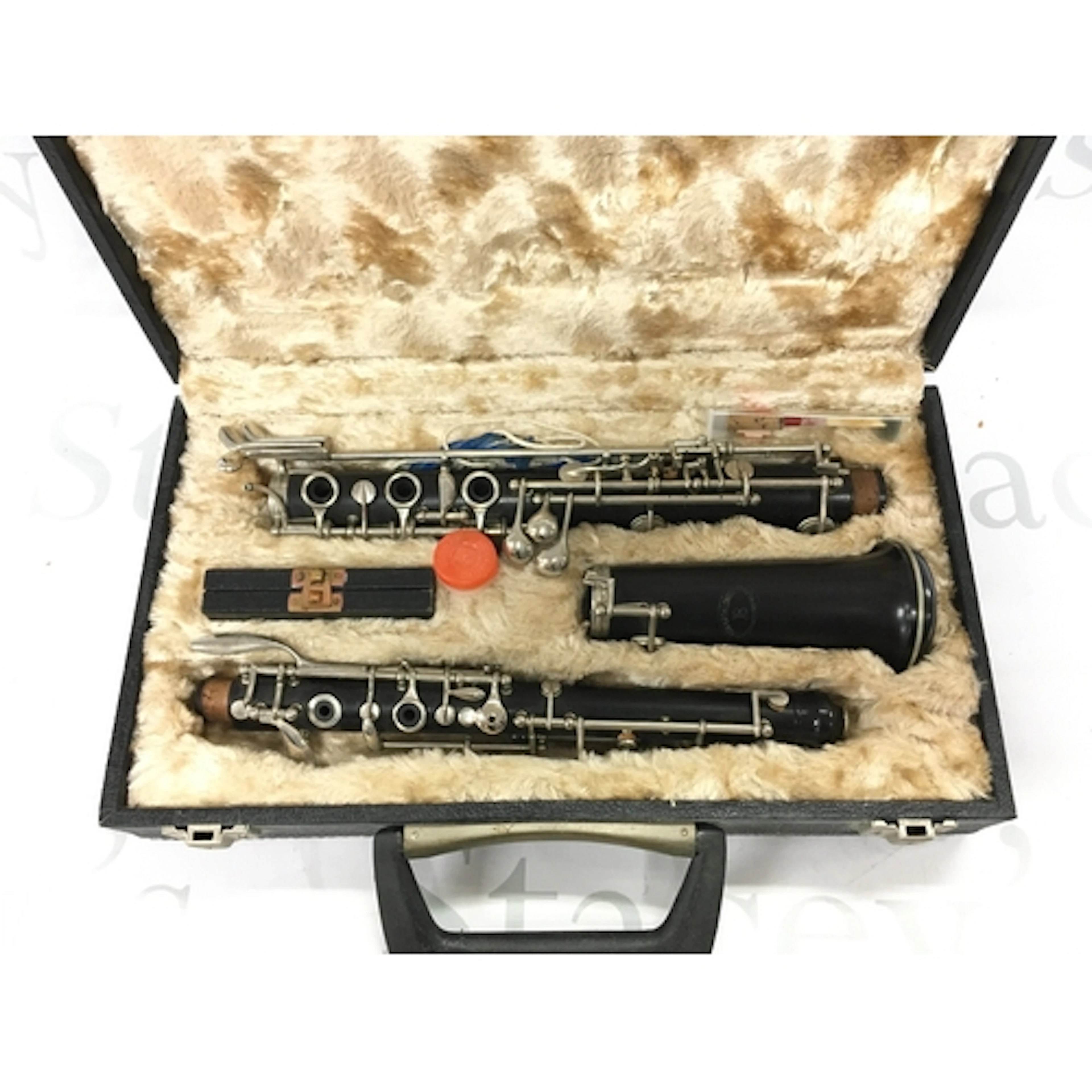 A Howard Romeo Orsi Milano oboe in a fitted case