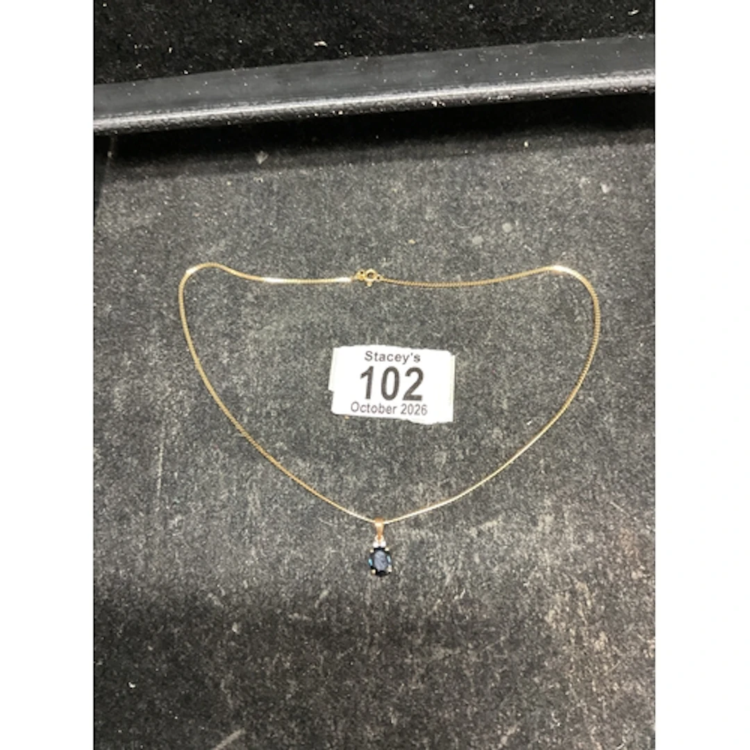 14 k gold necklace and Sapphire and Diamond pendant. Weight ...