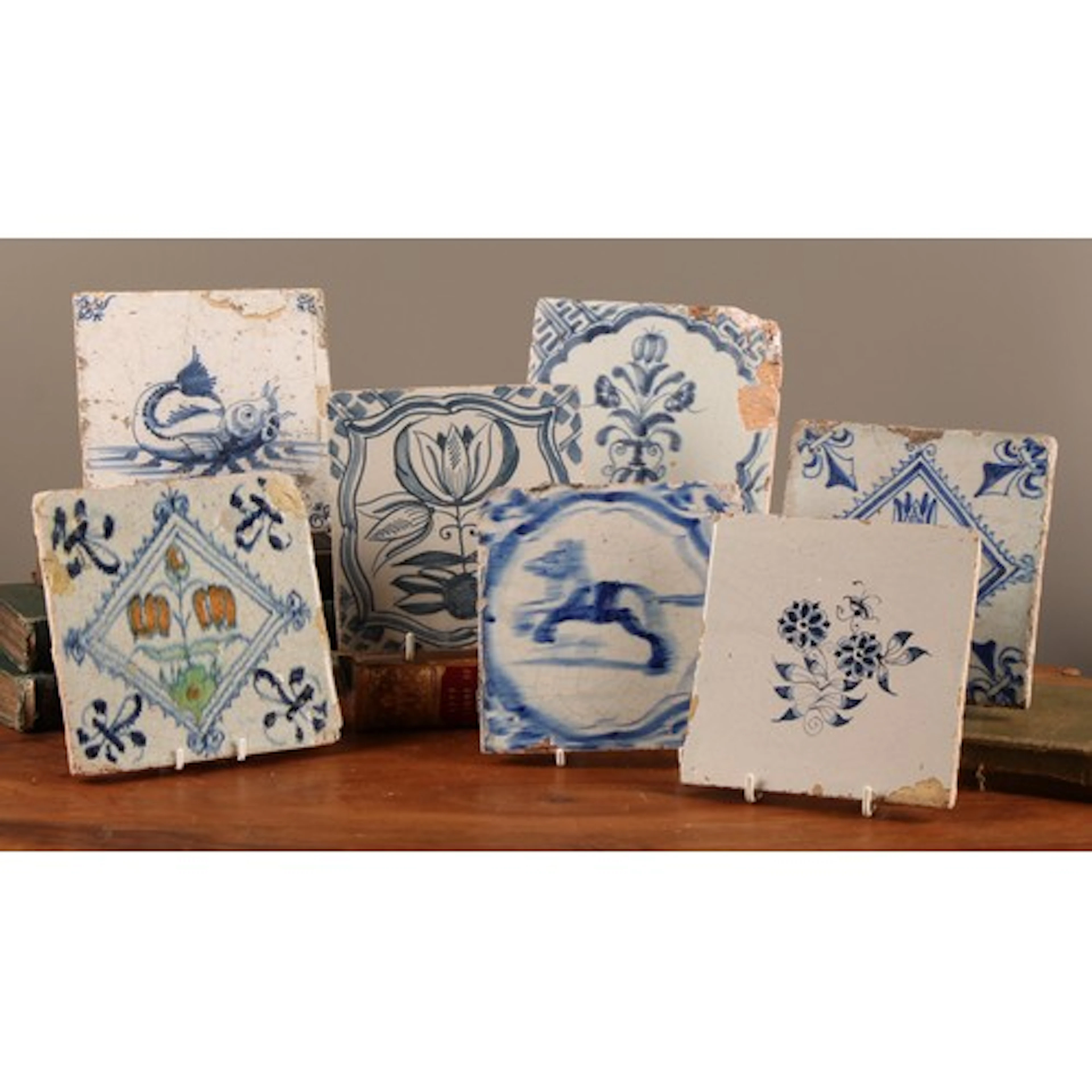 An 18th century Delft tile, hand-painted with a catfish in u...