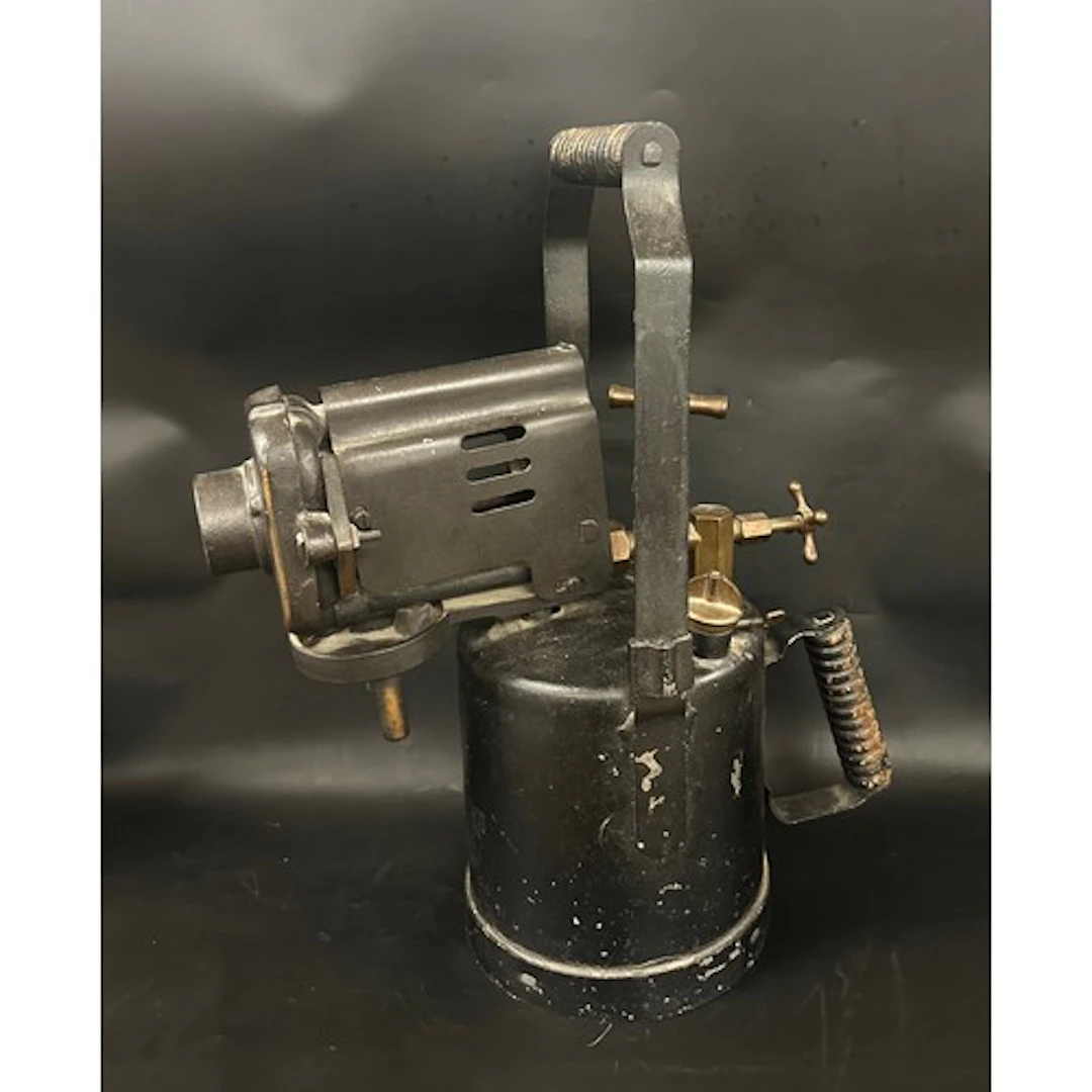 A large blow torch, marked 1943 and with broad arrow, Britis...