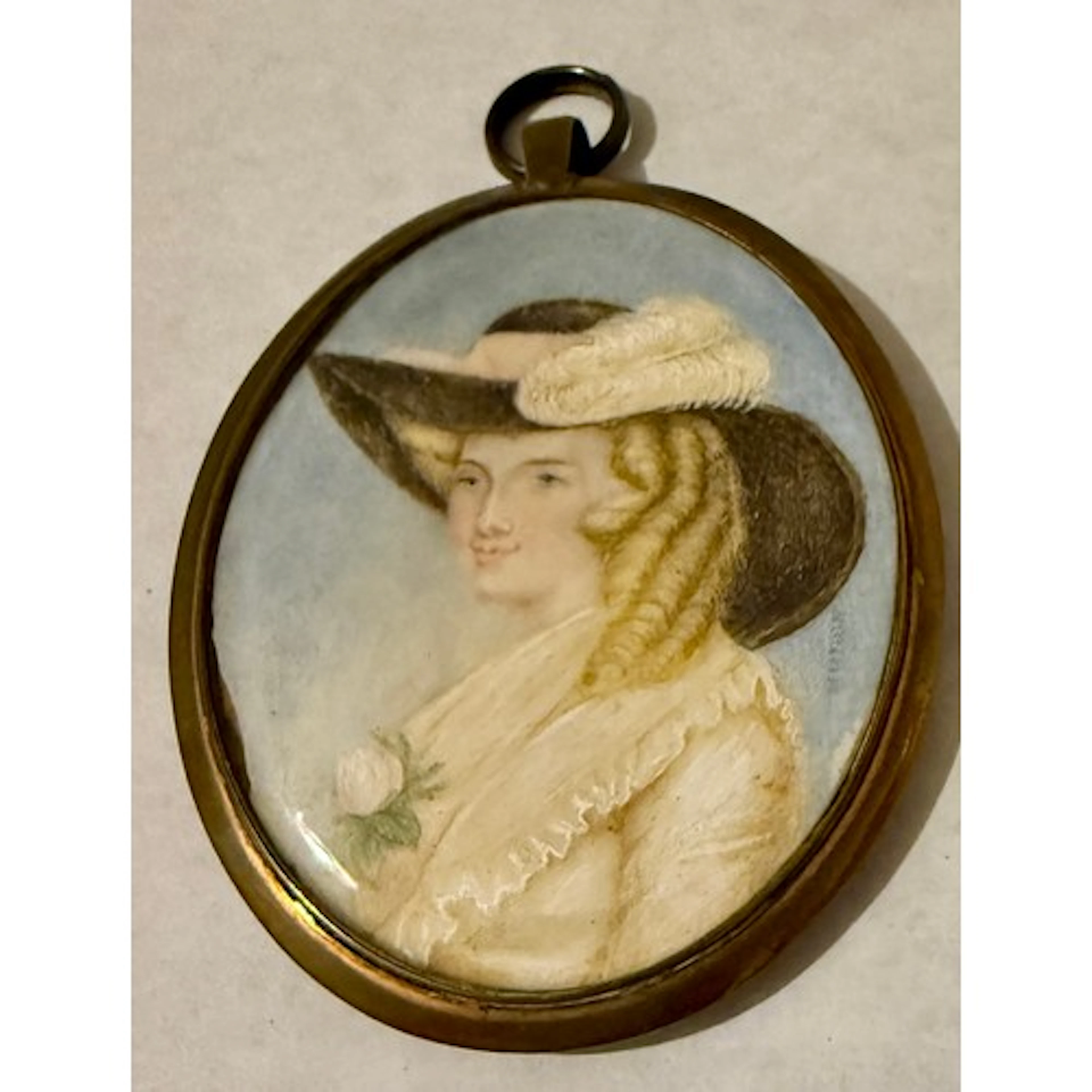 Ivory portrait miniature of a lady with blonde ringlets and ...