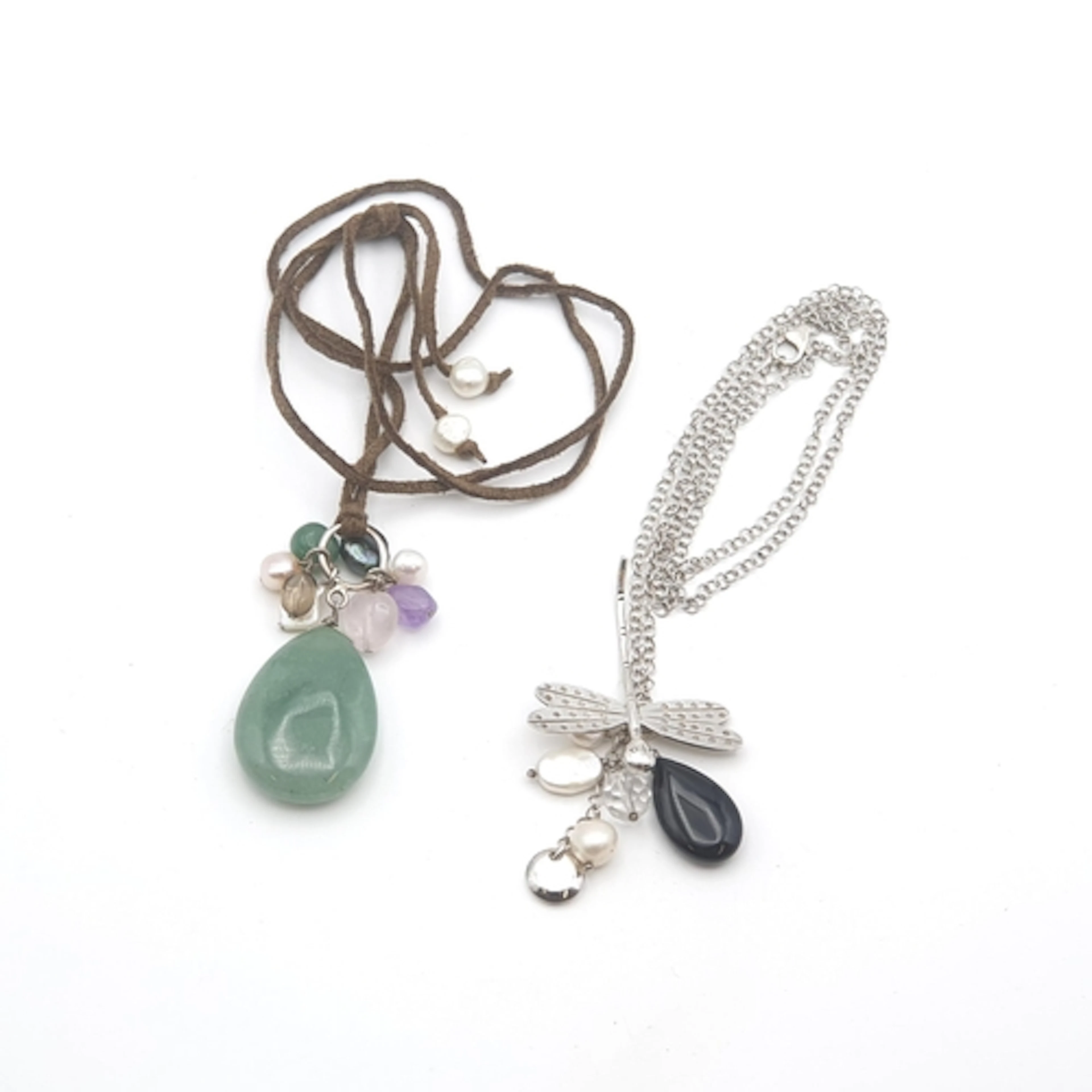 A white metal Dragonfly Pendant suspending a cluster of fres...