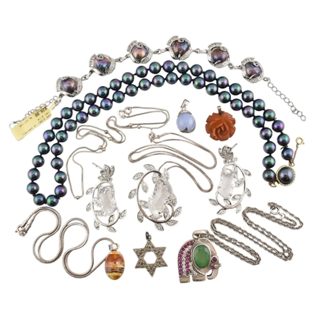 A selection of costume jewellery. Ten items to include: a bl...