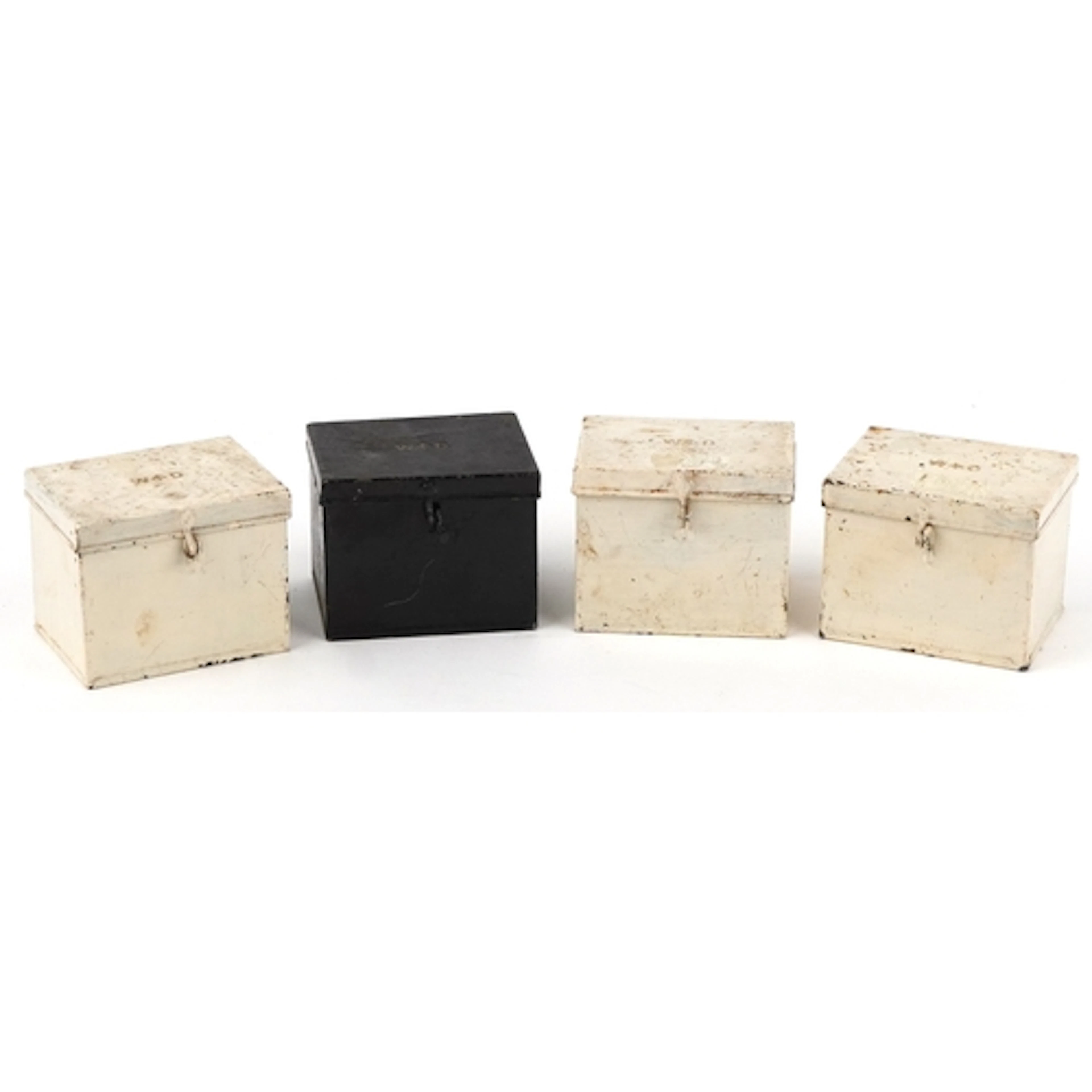 Four British military interest War Department tins, each wit...