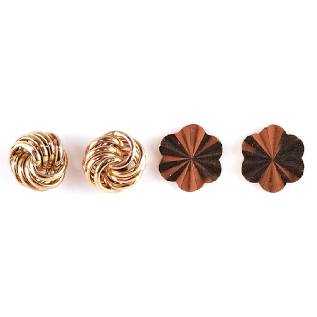 Two pairs of 9ct gold stud earrings, the largest 9.7mm in di...