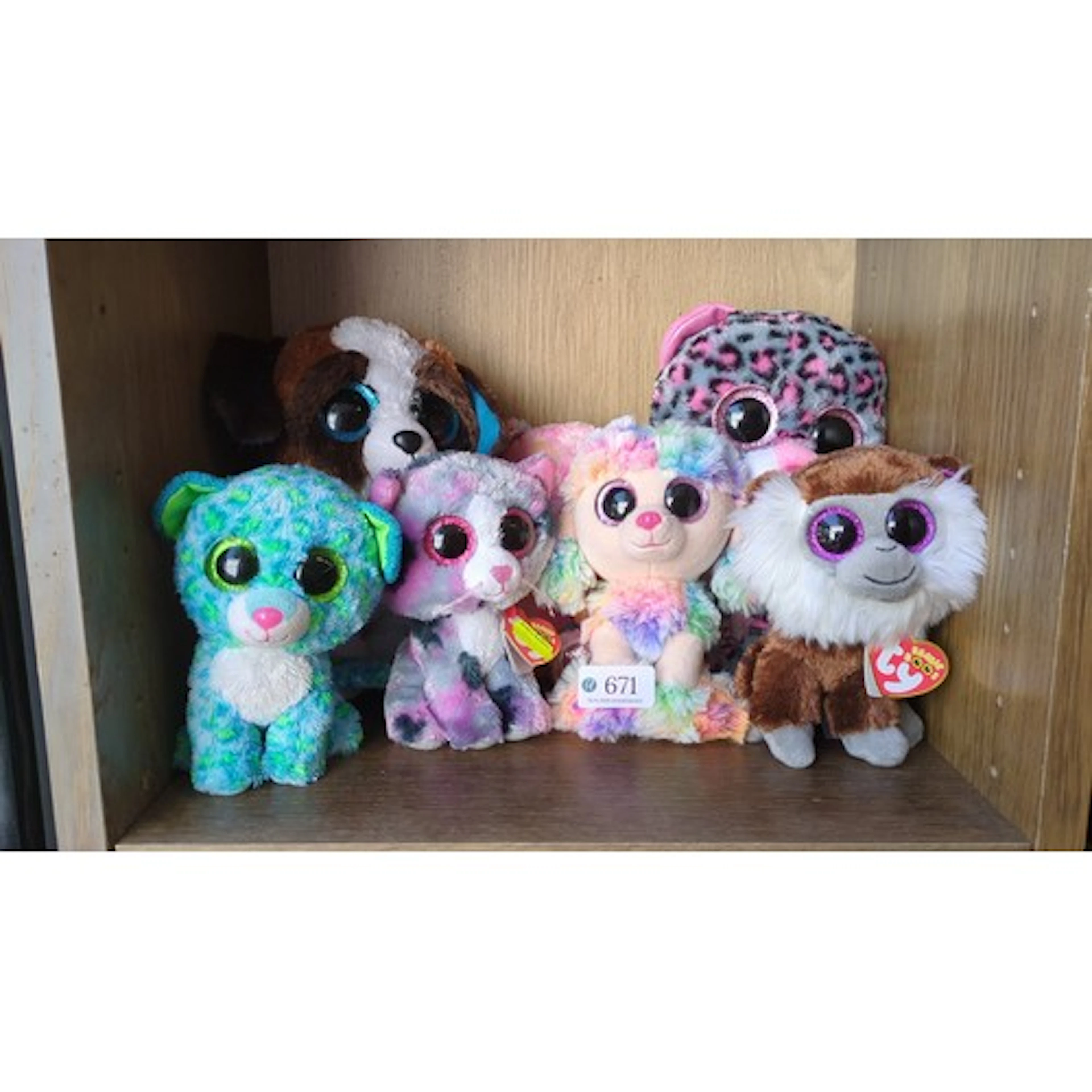 A group of Ty Beanie Boos plush toys, various animal forms w...