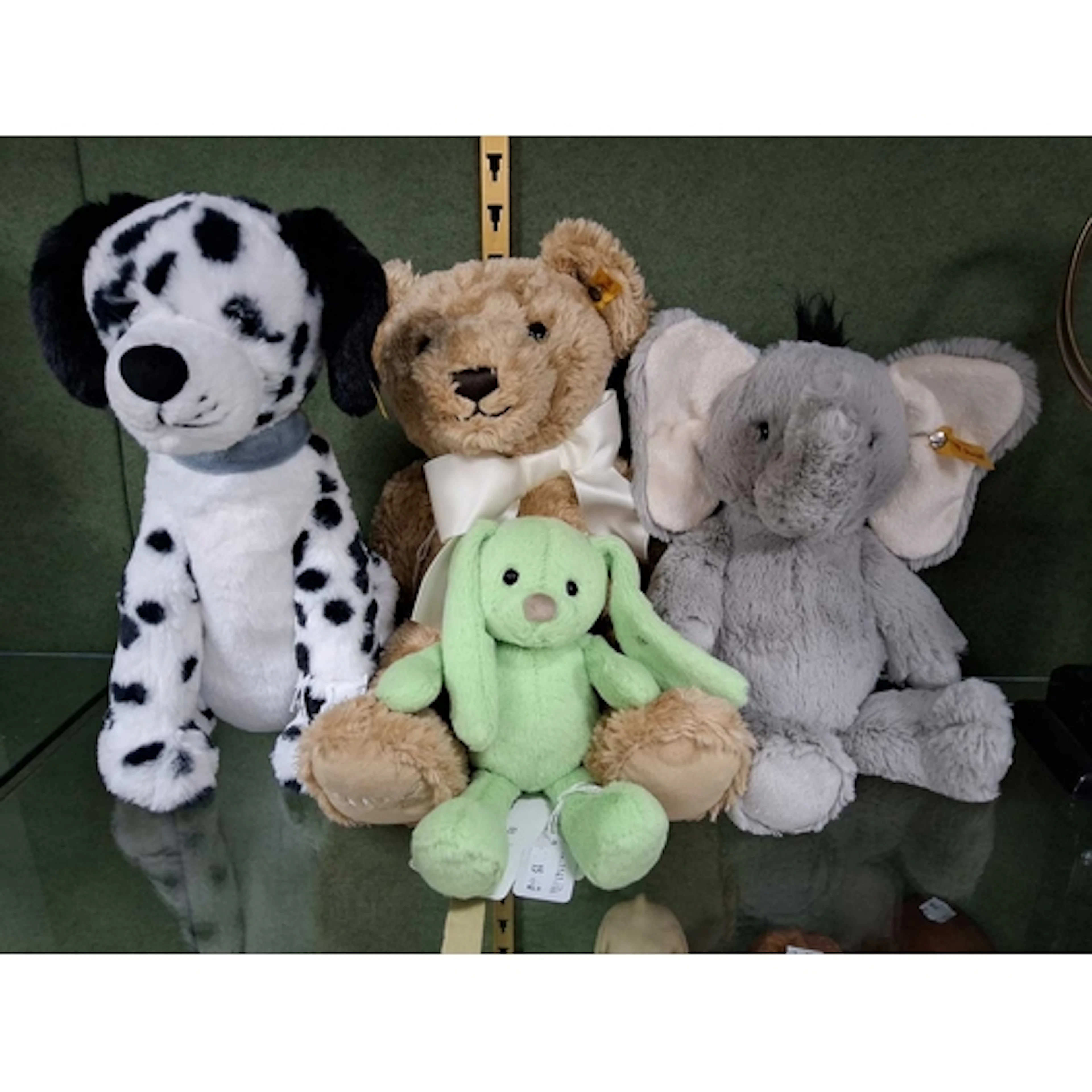 A COLLECTION OF FOUR MODERN STEIFF PLUSH TOYS, a varied grou...