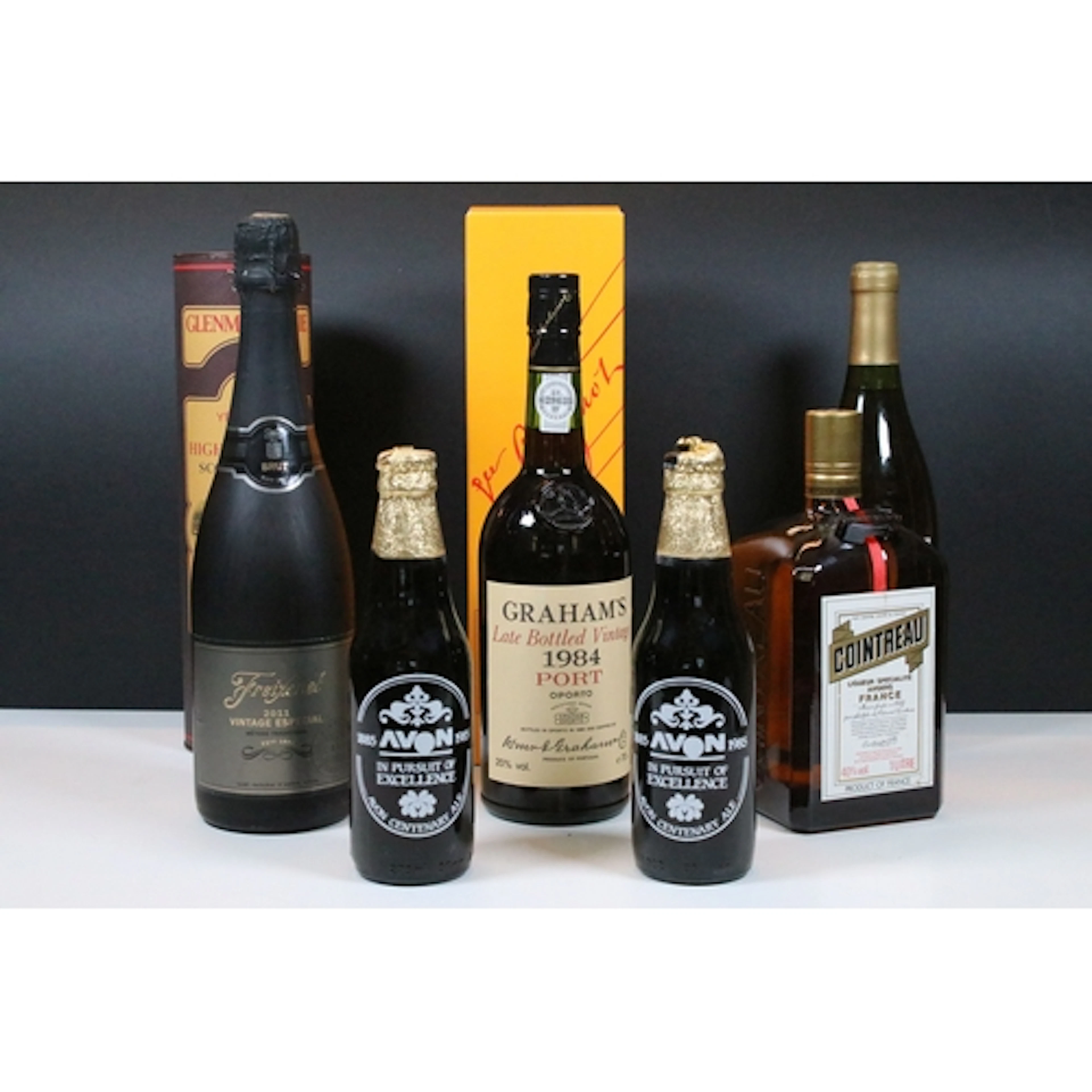 Group of eight bottles of alcohol, to comprise Glenmorangie ...