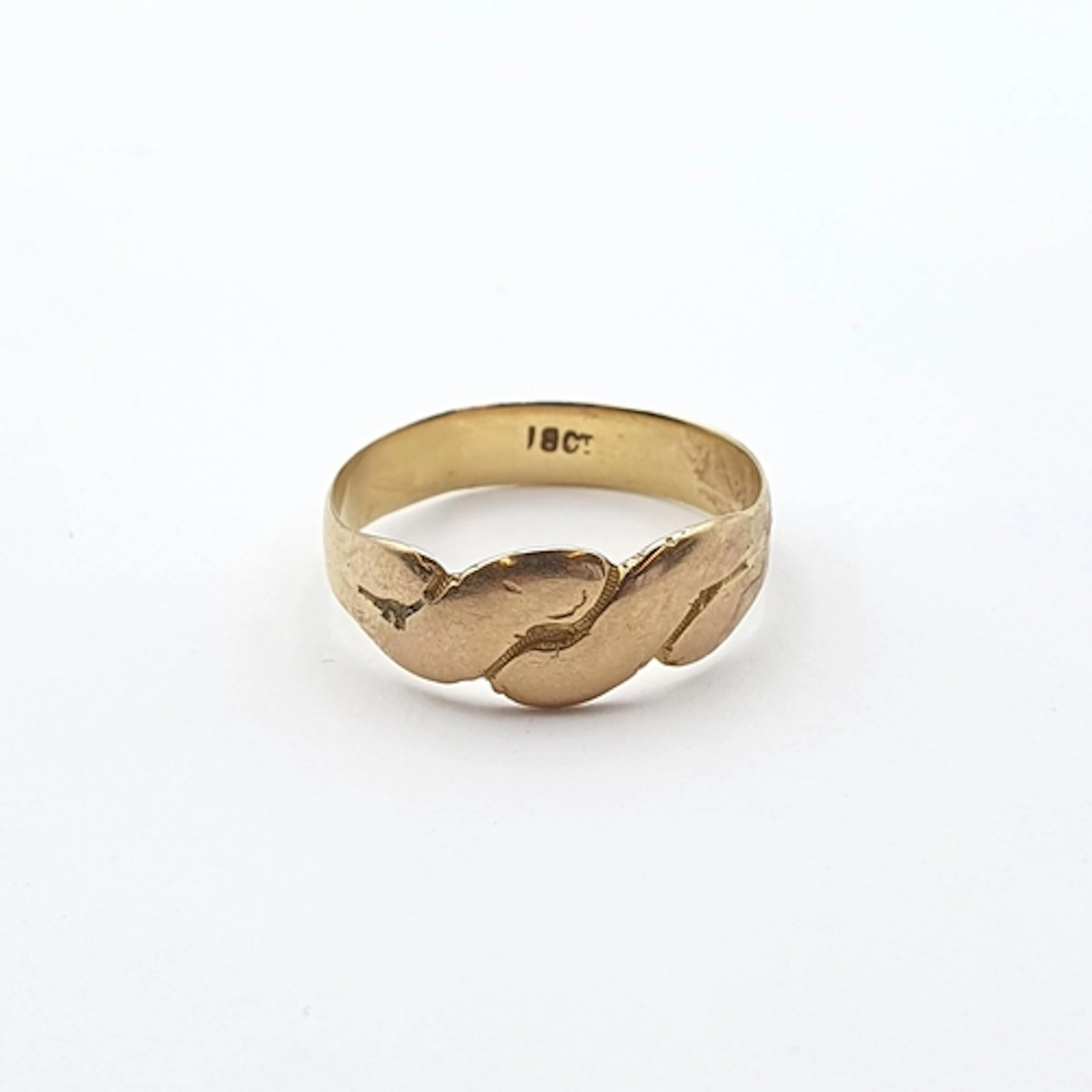 A gold crossover style Ring stamped 18CT, ring size Q, appro...
