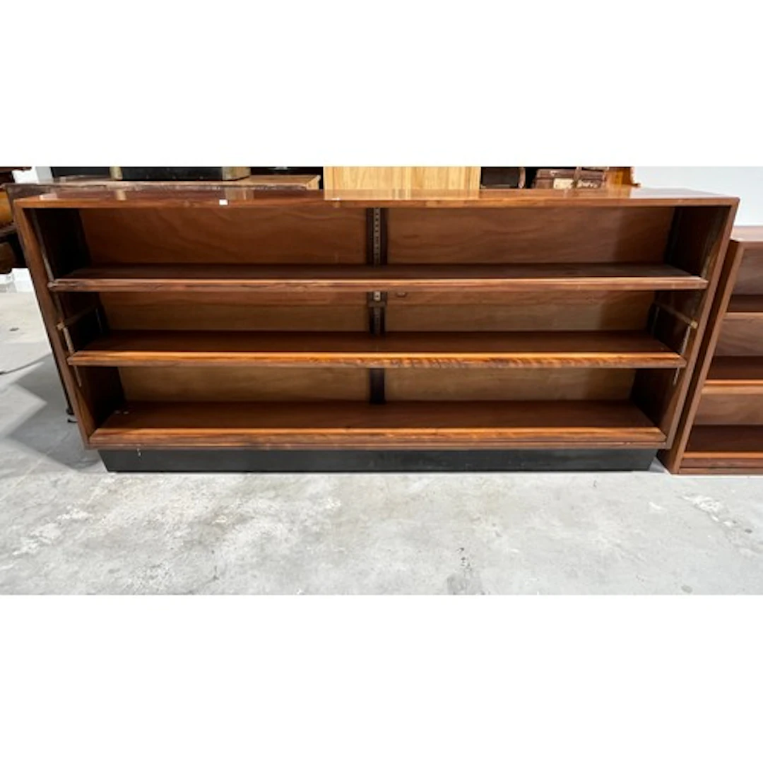 20th century teak open bookcase of simple rectangular design...