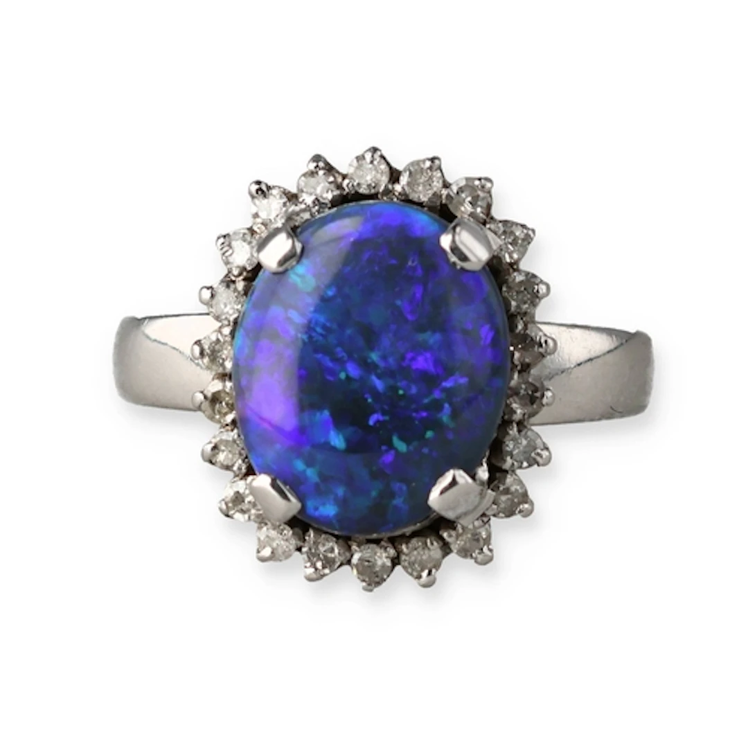 AN 18CT WHITE GOLD, DIAMOND AND BLACK OPAL RING 5.4gms...