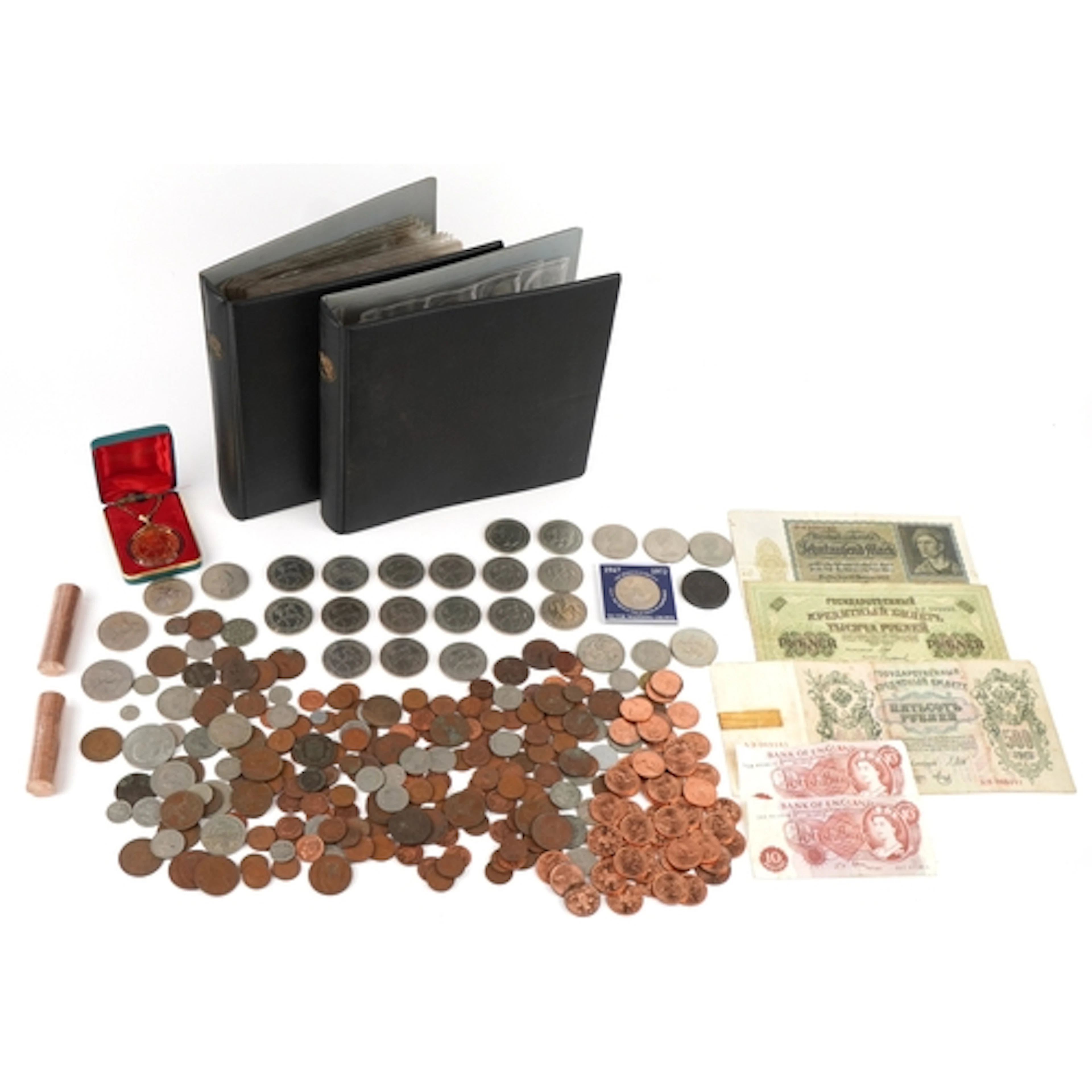 A quantity of British and world coinage, some in coin albums...