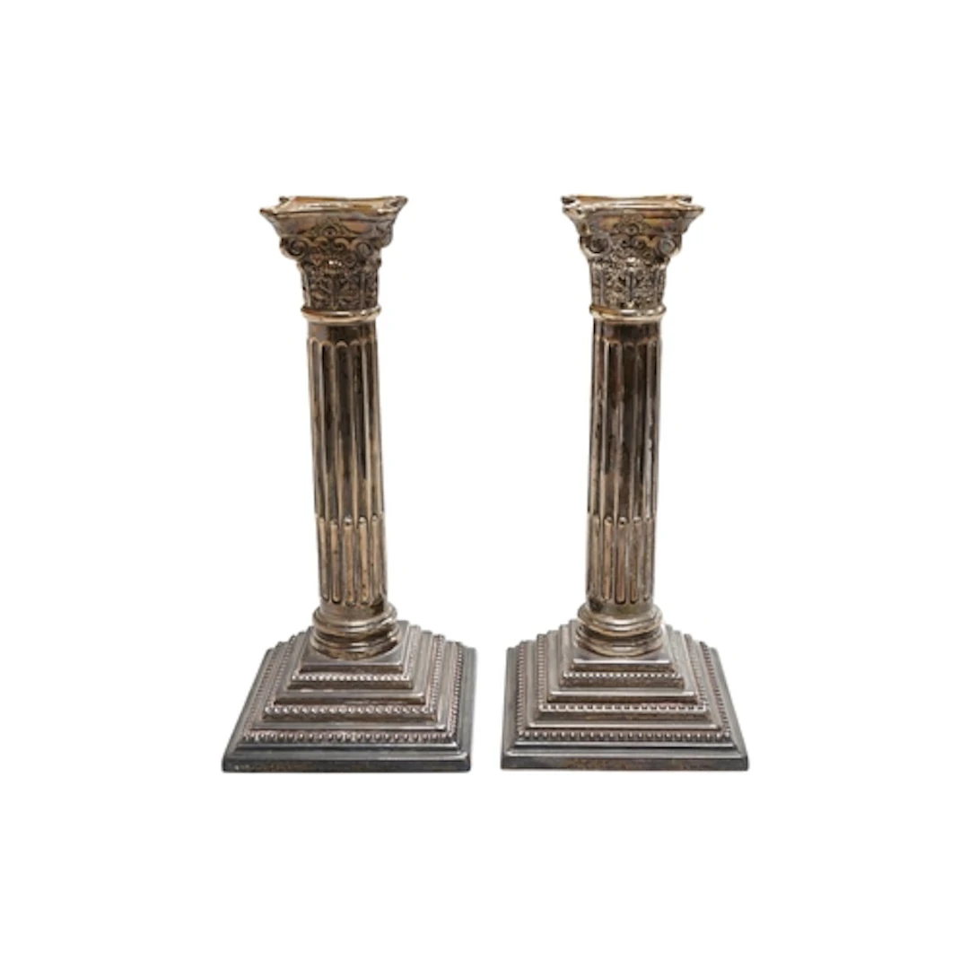 A pair of Elizabeth II silver mounted Corinthian column cand...
