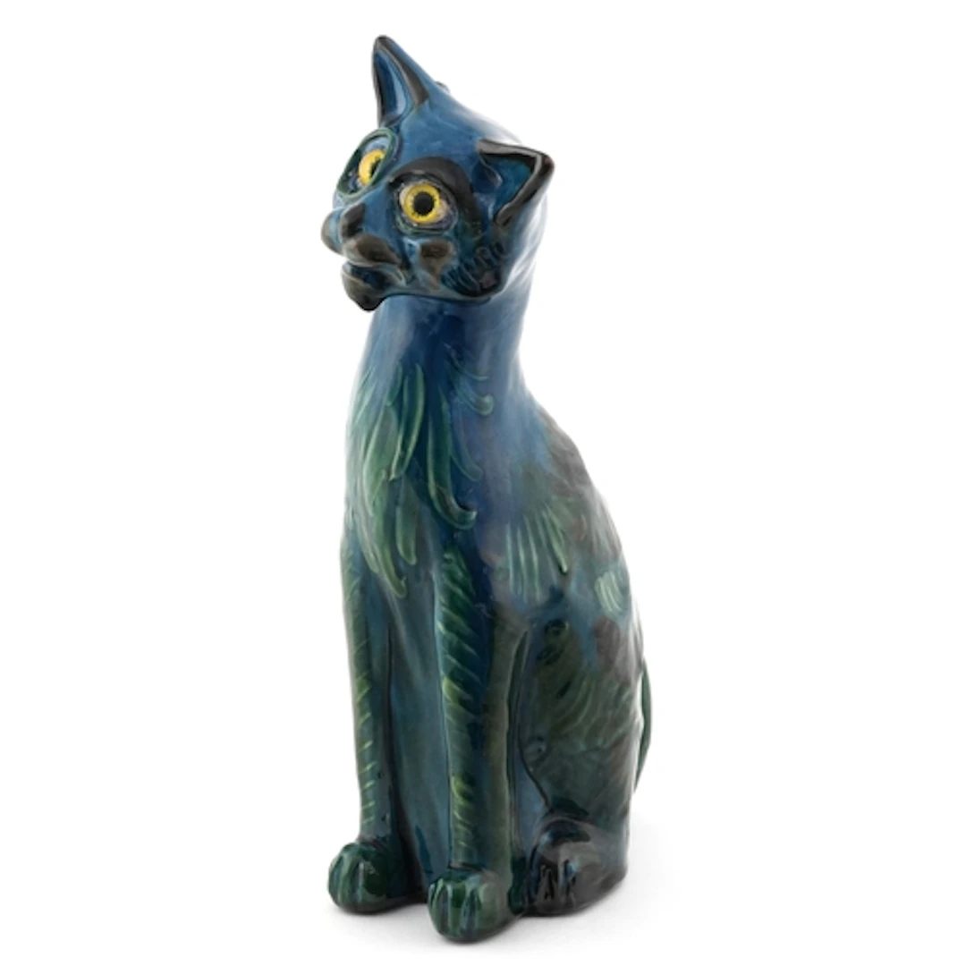 C H Brannam, Arts & Crafts pottery seated cat with monocle a...