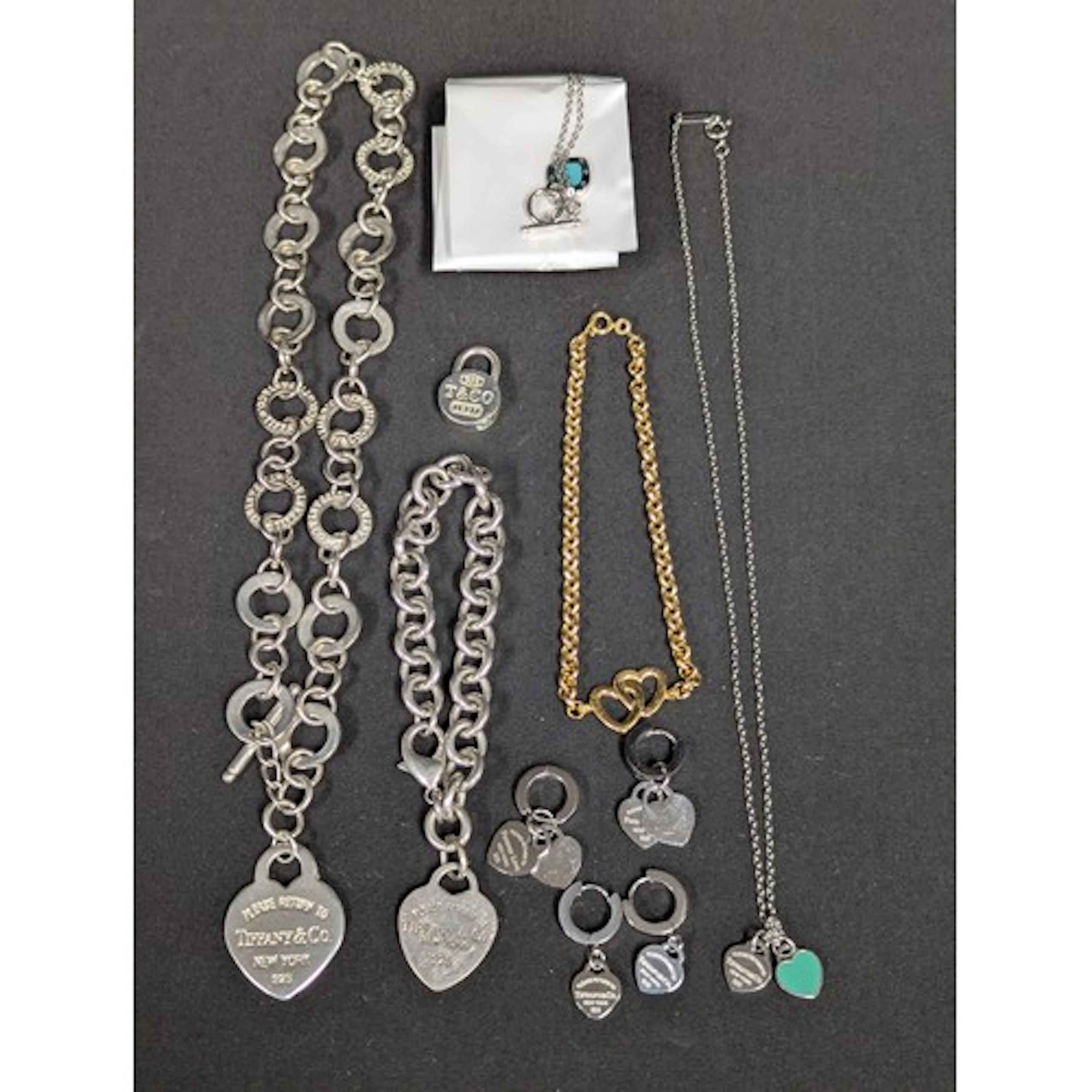 A Tiffany & Co. white metal necklace, heart shaped pendant, ...