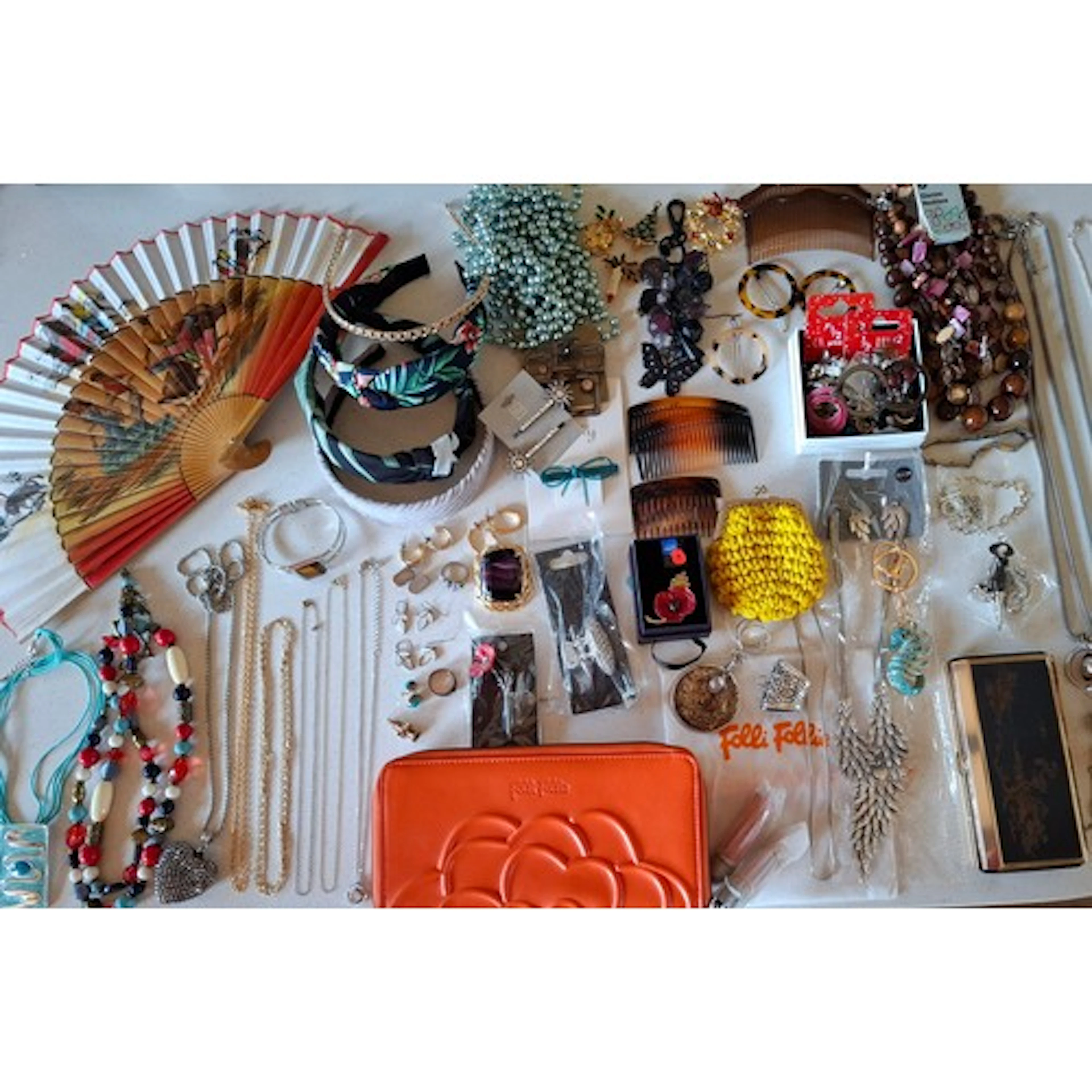 A quantity of modern costume jewellery, hair combs, hair sli...
