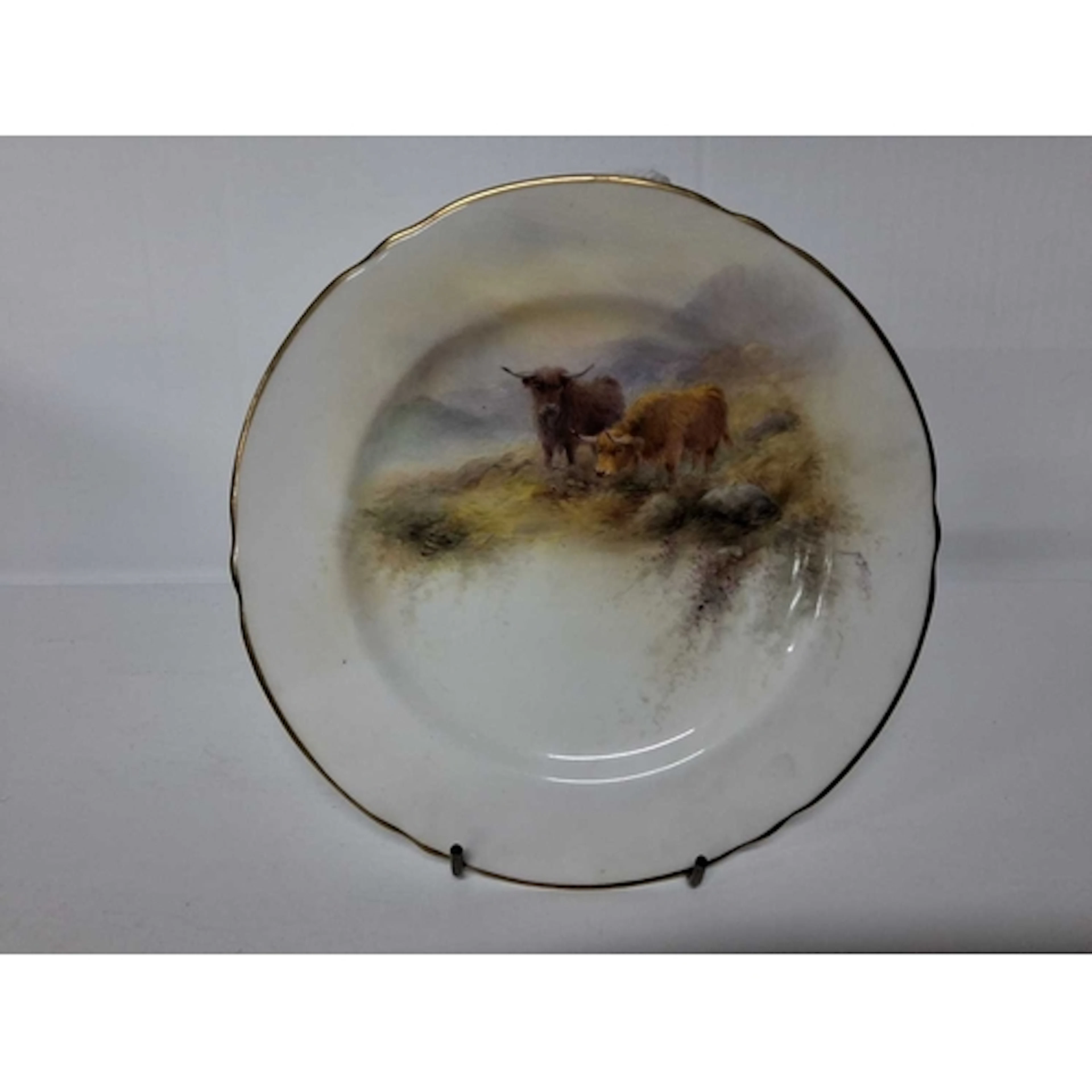 HARRY STINTON FOR ROYAL WORCESTER: A PLATE PAINTED WITH HIGH...