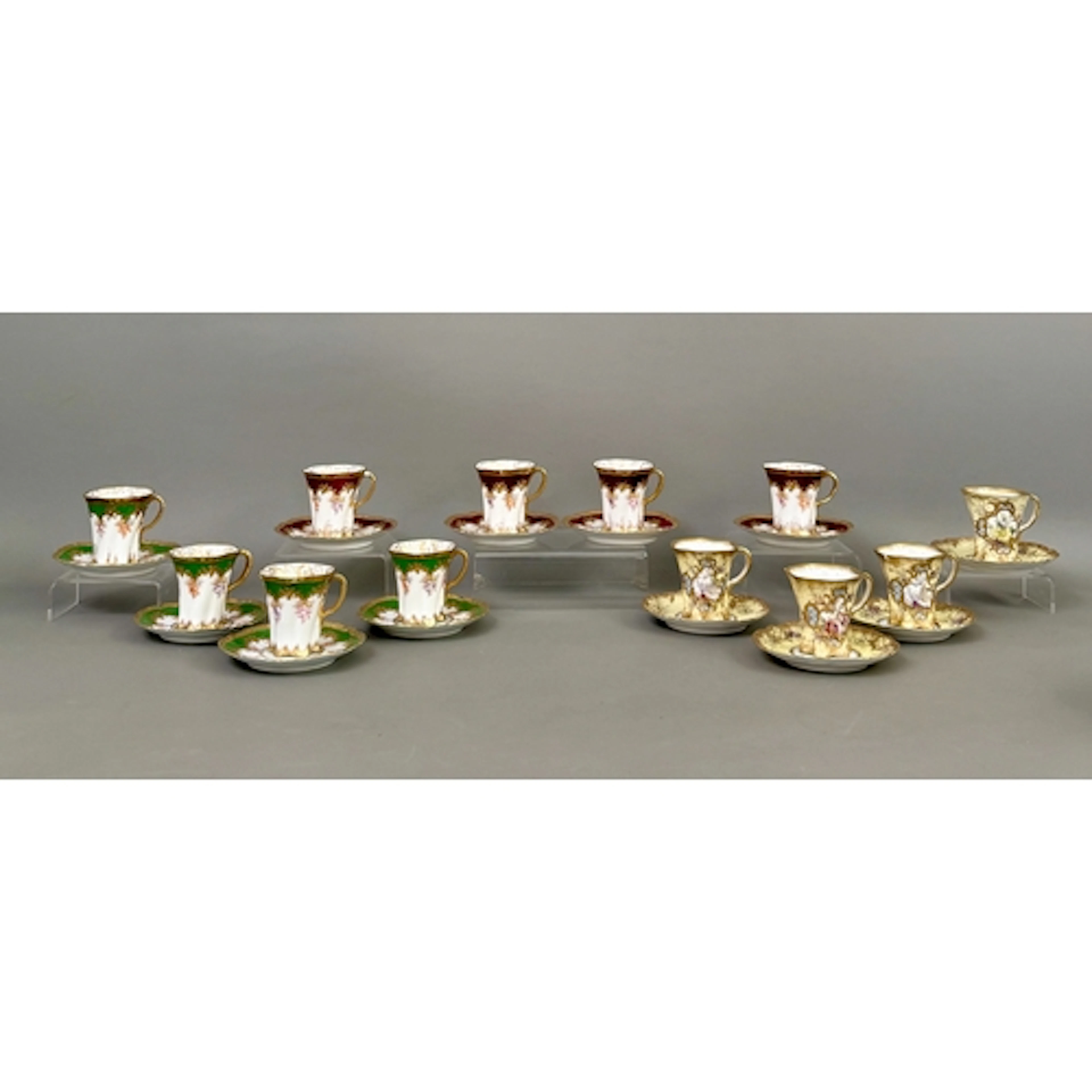 A harlequin set of 12 Dresden porcelain demitasse cups - ear...