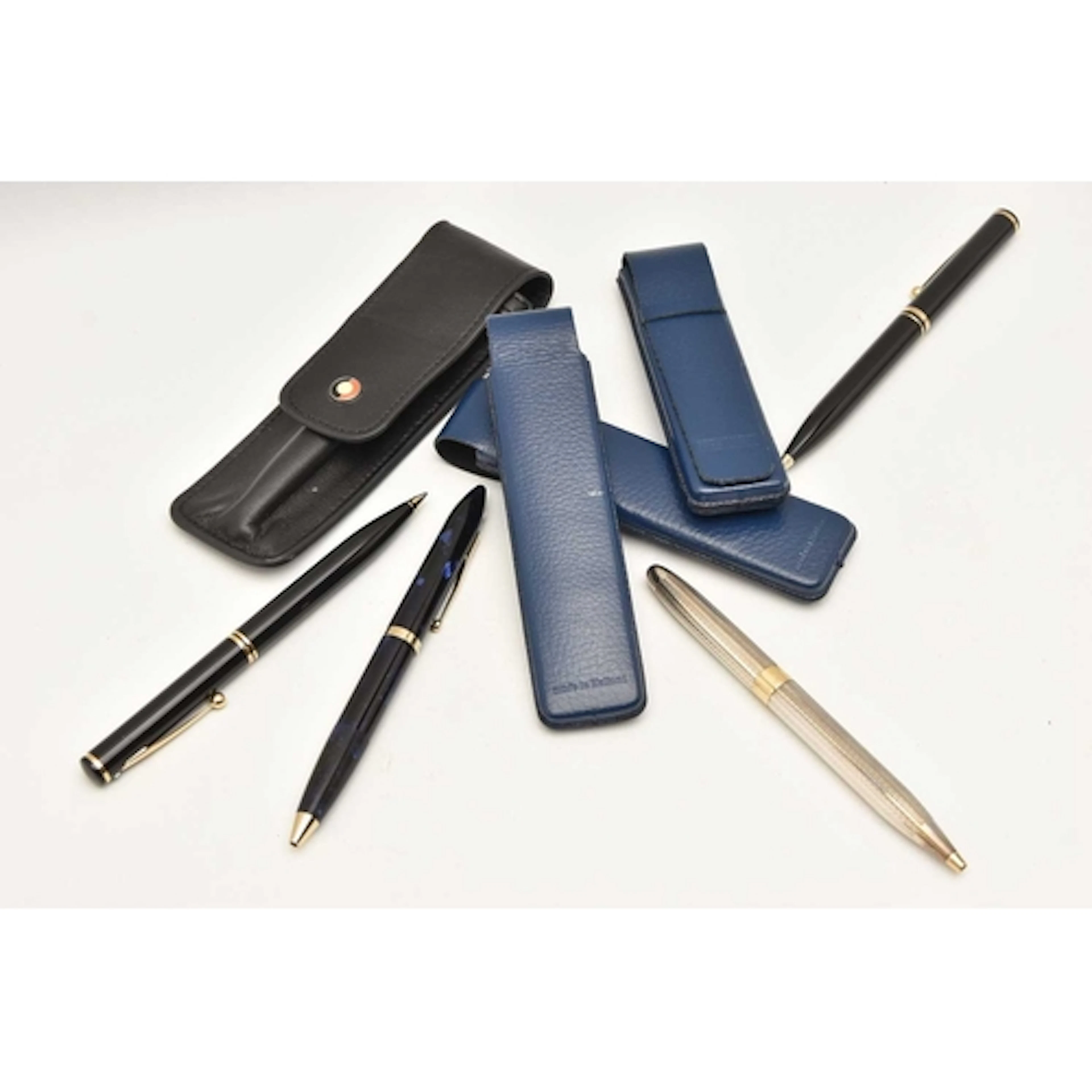 FOUR 'SHEAFFER' PENS, to include a bi-colour ball point pen,...