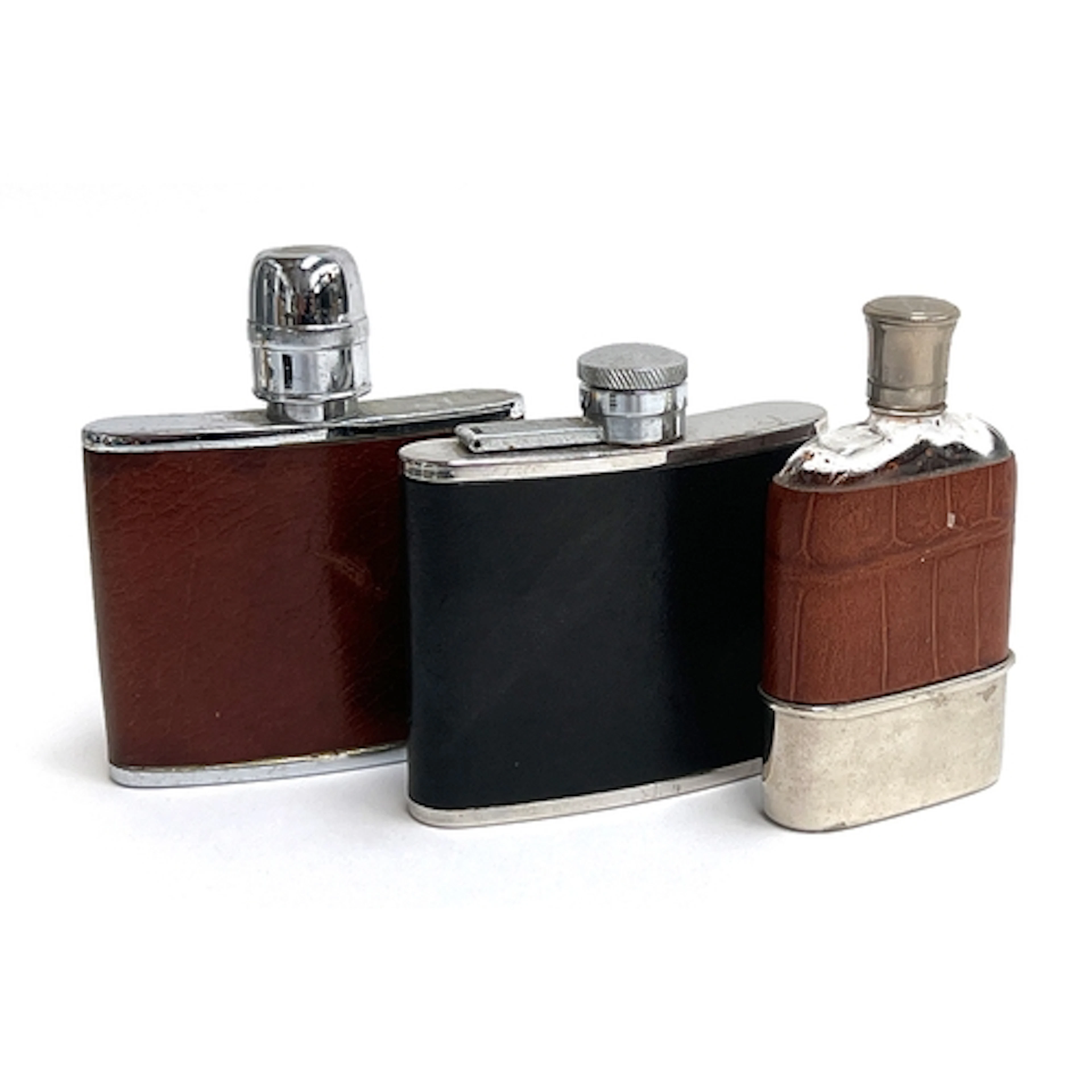 Three leather clad hip flasks, one by Swaine Adeney (3)