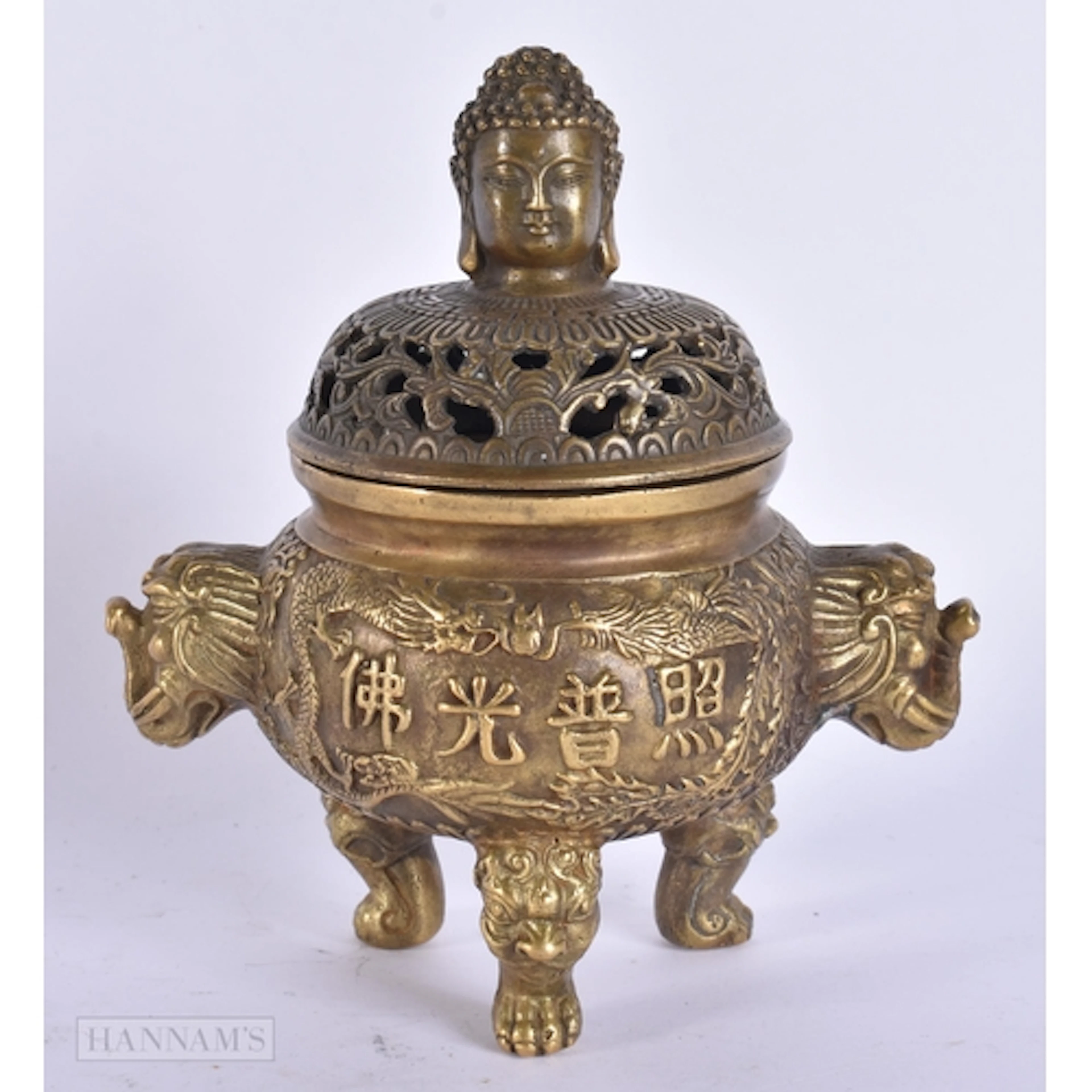 A CHINESE TWIN HANDLED BRONZE CENSER AND COVER. 12 cm x 14 c...