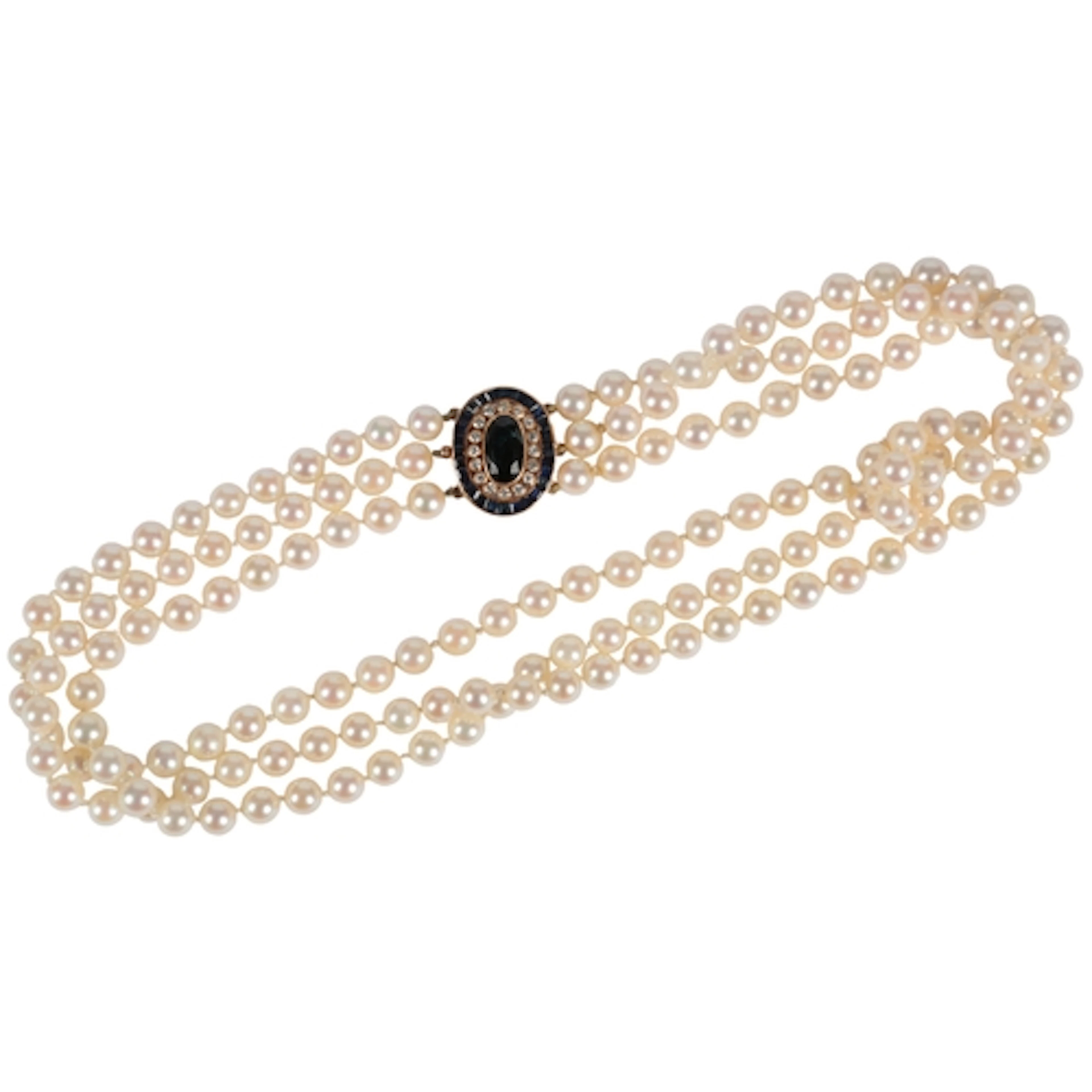A cultured pearl, sapphire and diamond necklace, designed as...