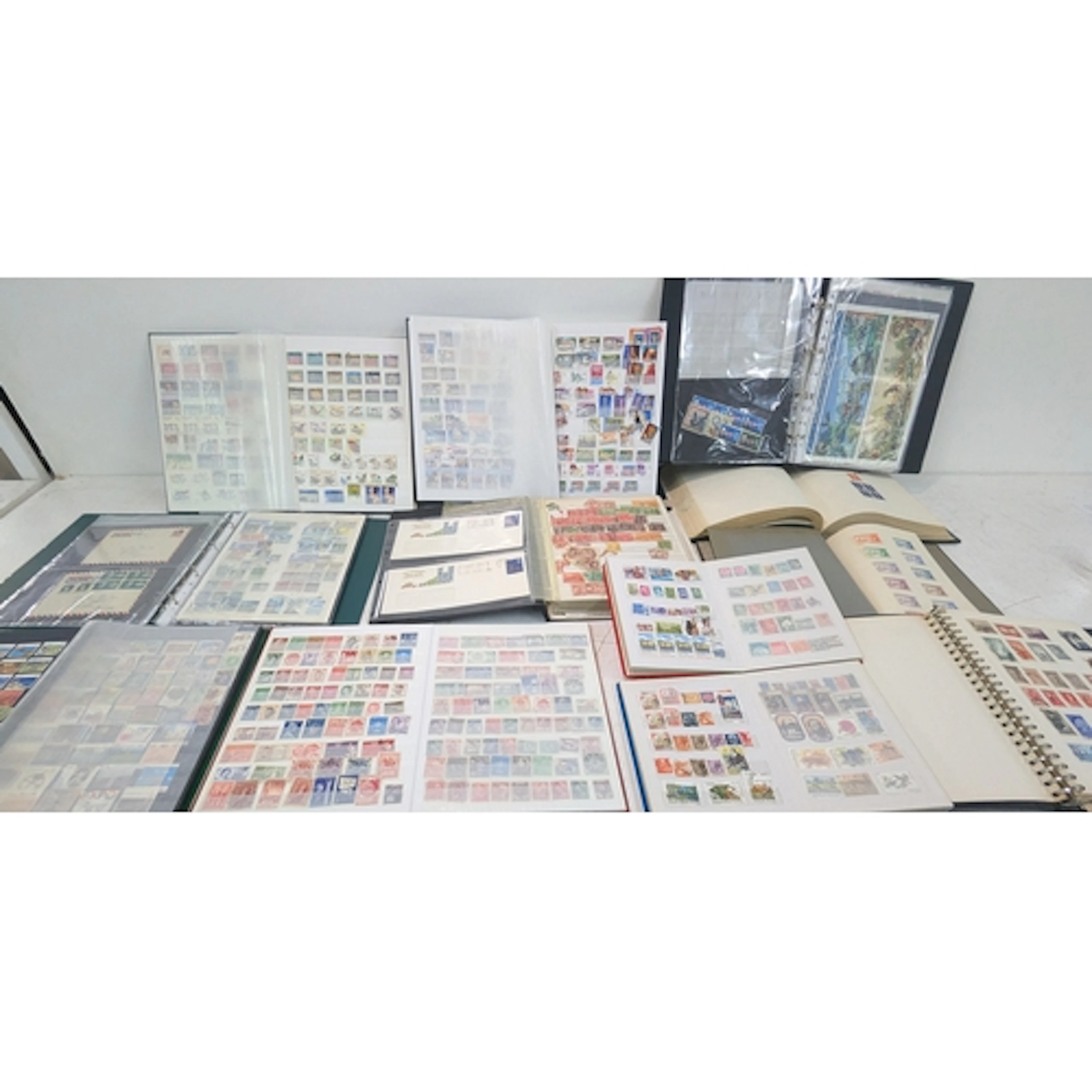 A large collection of postage stamps from around the world, ...