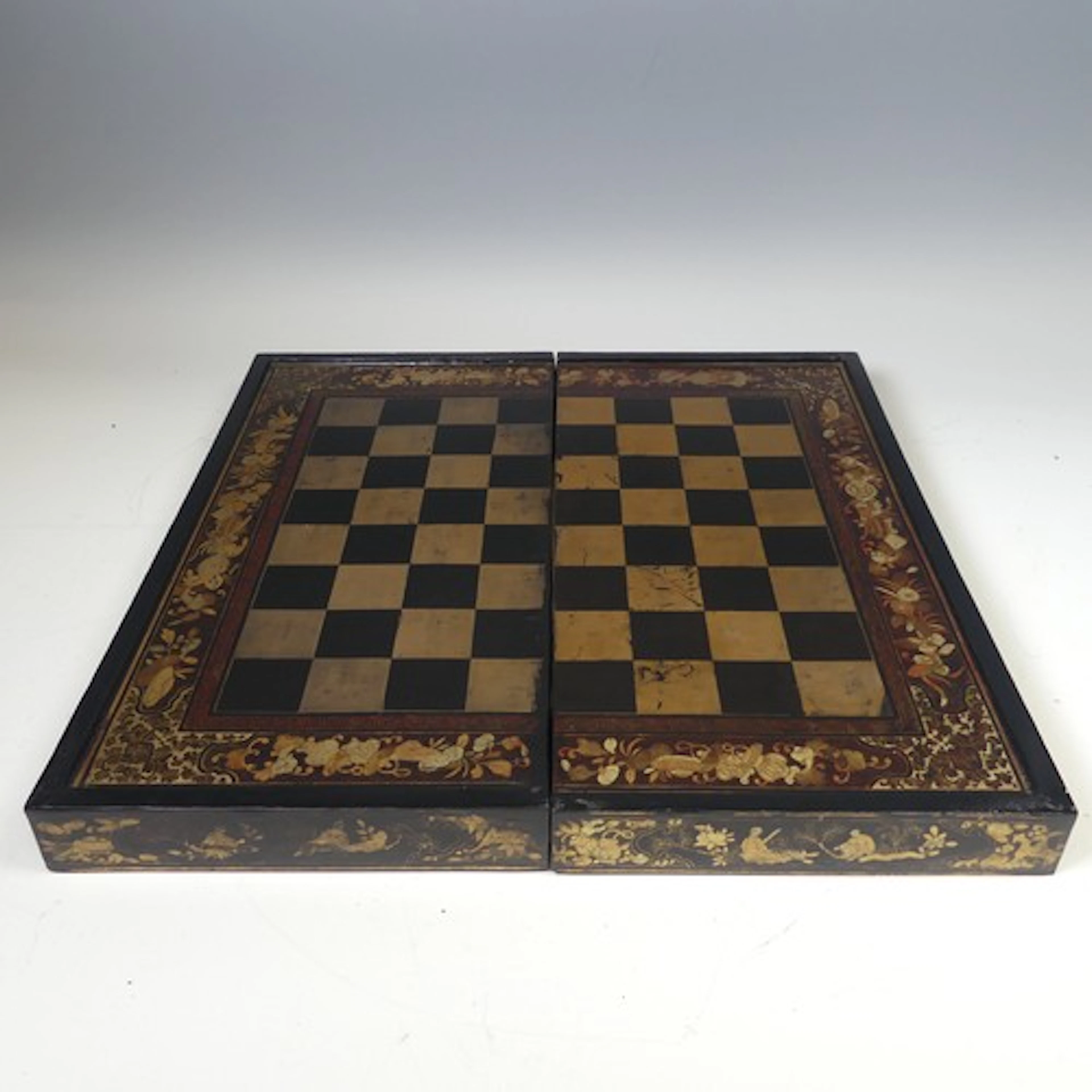 A Chinese export black lacquered and gilt painted folding Ga...